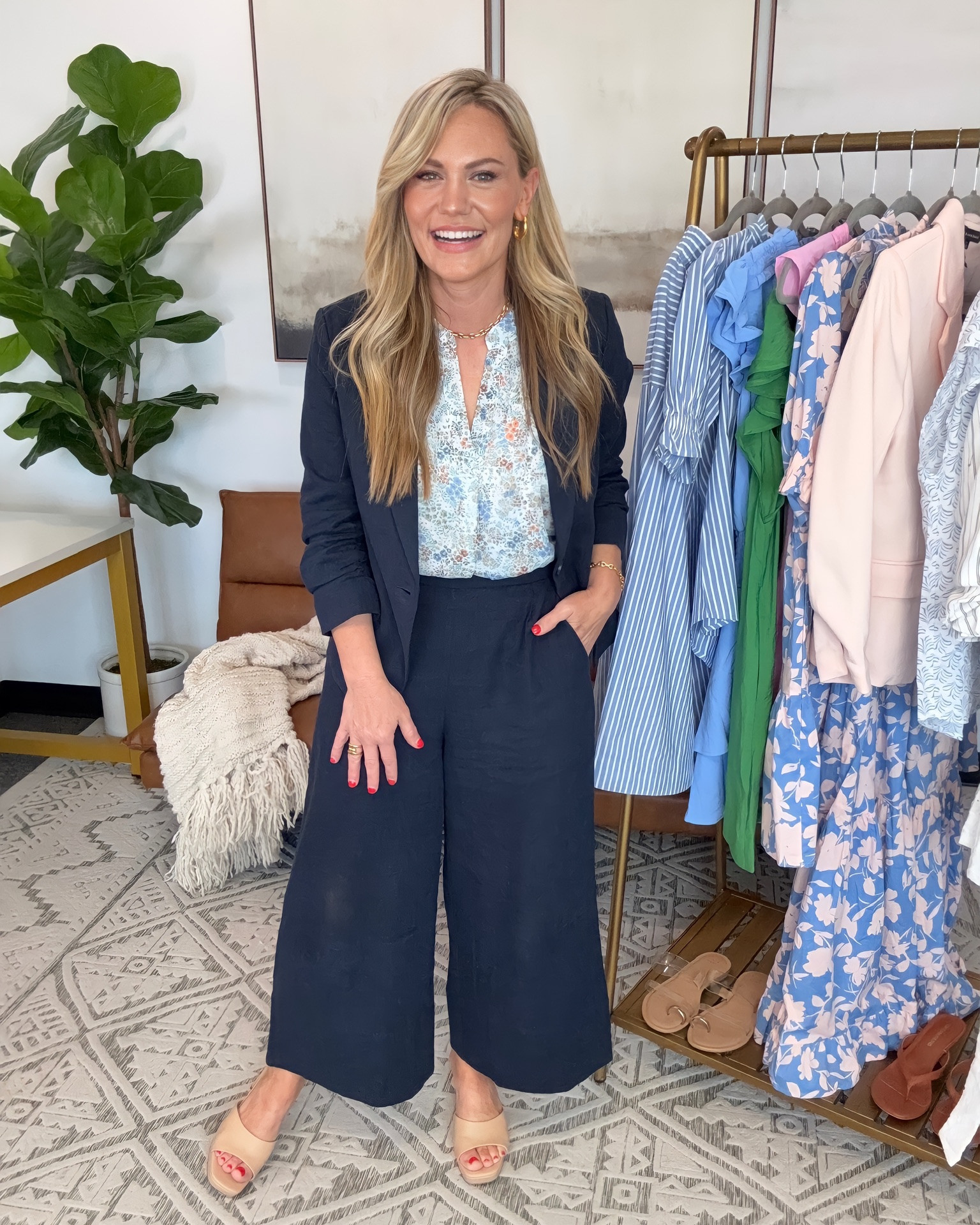 Wide leg trousers are one of the easiest ways to create polished workwear outfits while still feeling comfortable throughout the day. These navy Gibsonlook trousers paired with the floral flutter sleeve blouse create a softer business casual look, and the matching navy blazer adds structure for meetings, conferences, office wear, and more professional settings. Each piece also works separately within a capsule wardrobe, making it easy to build additional outfits with denim, skirts, white trousers, or basic layering pieces.

Top: Small
Pants: Small
Blazer: Small
Shoes: 7.5
Bra Size: 34DD
Height: 5’2

gibsonlook  blazer outfit  workwear outfit  business casual outfit  office outfit ideas  wide leg trousers  navy blazer outfit  matching blazer set  teacher outfit  conference outfit  professional style  floral blouse outfit  spring workwear  petite workwear  capsule wardrobe pieces  polished office style  mix and match outfits  AudrieDollins

#LTKWorkwear #LTKOver40 #LTKootd