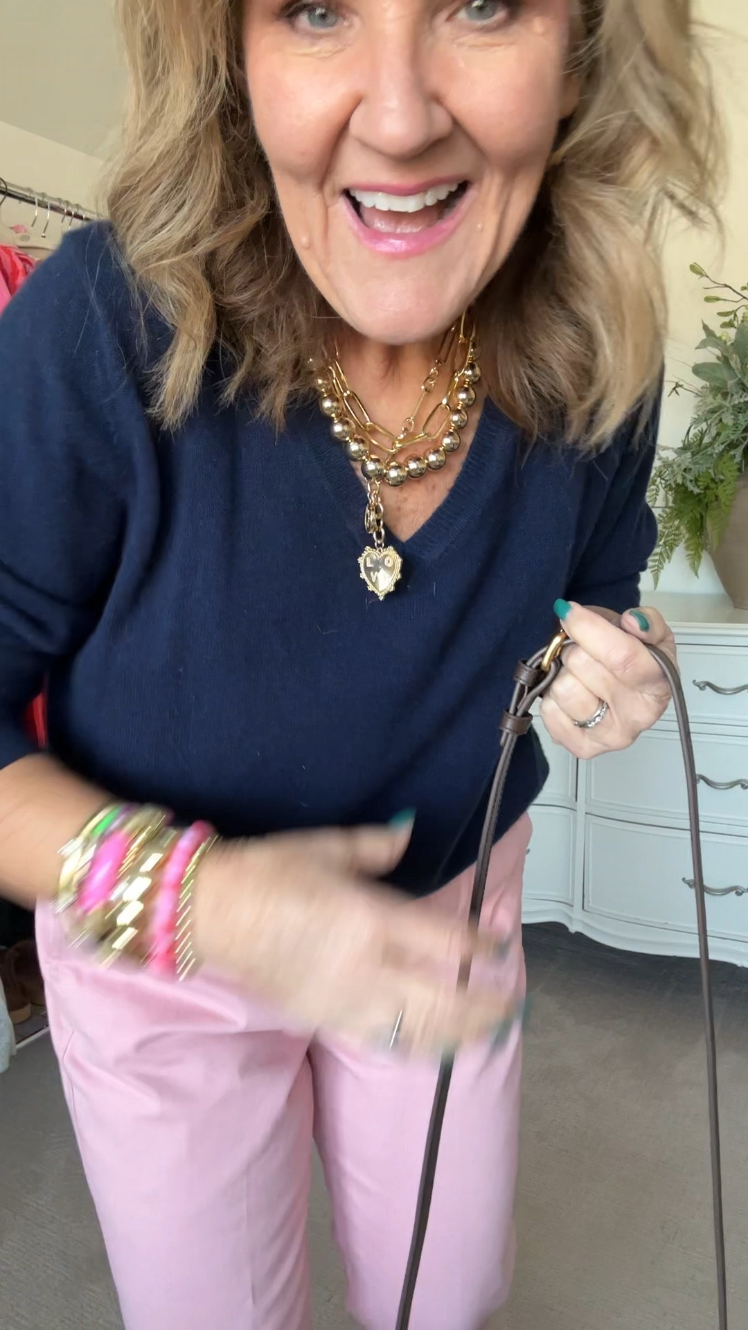 This cashmere V-neck I am in a XL, if I ordered the medium, it be fitted. You decide how you wanna wear it I like the relaxed fit.
Pink girlfriend chinos size 29 
New quince brown leather bag is stunning! It would rival any designer bag 
Allie and Bess 20% off code  NANETTE20


Winter outfit, valentines, pink pants, navy sweater, brown bag, colorful jewelry, gold, jewelry, gold bead, necklace, heart necklace

#LTKItBag #LTKFindsUnder100 #LTKOver40