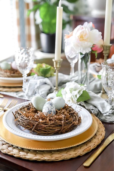 My fun Easter place setting has a mini grapevine wreath with filler and some faux robin’s eggs. You can buy little nests that are cute, too  

#LTKhome #LTKSeasonal