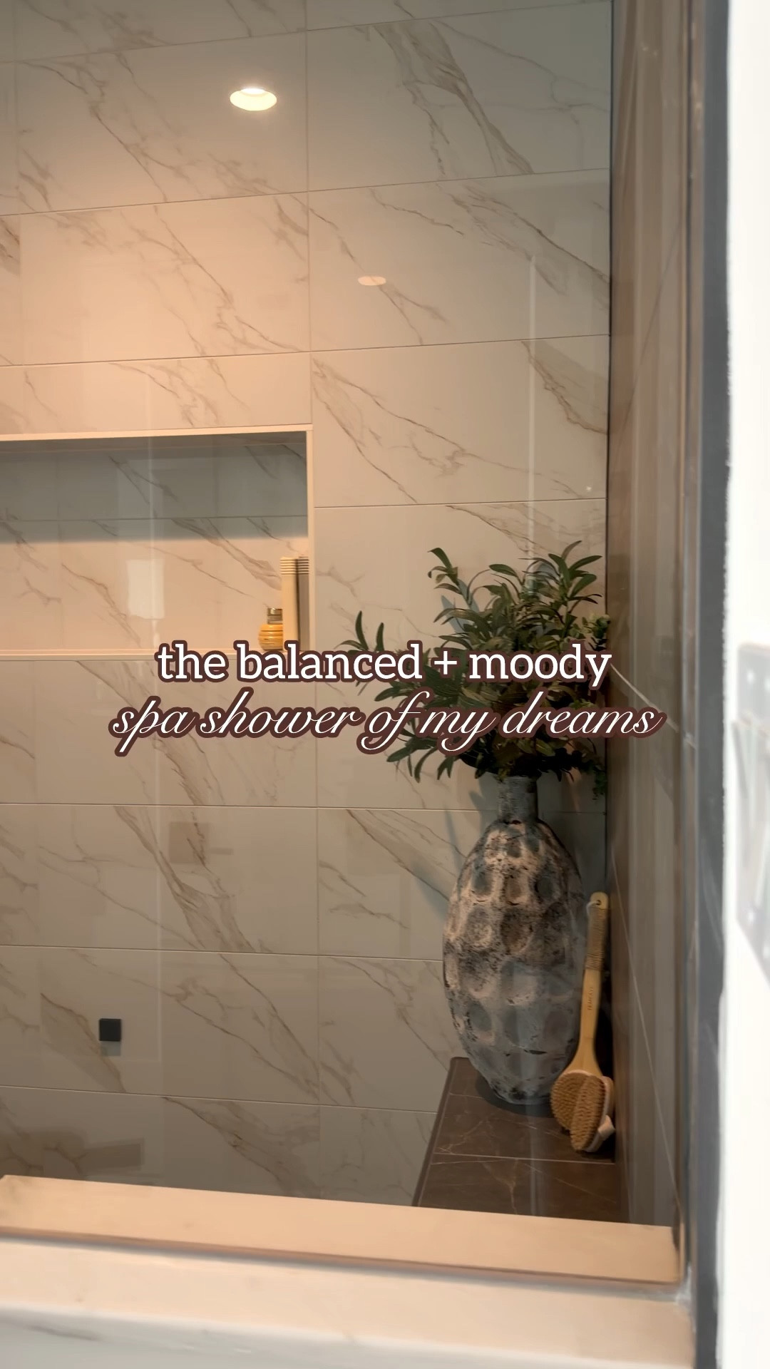 Primary shower - balanced & moody vibes 🤤 

✨Here’s what we used: 

• Shower Pan Floor: 
Emser Sterlina II Asphalt Matte - 2” x 2” Mosaic

• Shower Walls: 
Emser Nobleza 12” x 24” Lugo Polished

• Bench Wall & Bench: 
Emser Sterlina II 12” x 24” Asphalt Matte

#homebuilding #customhomebuildideas #bathroomrenovations

#LTKmorningroutine #LTKHome