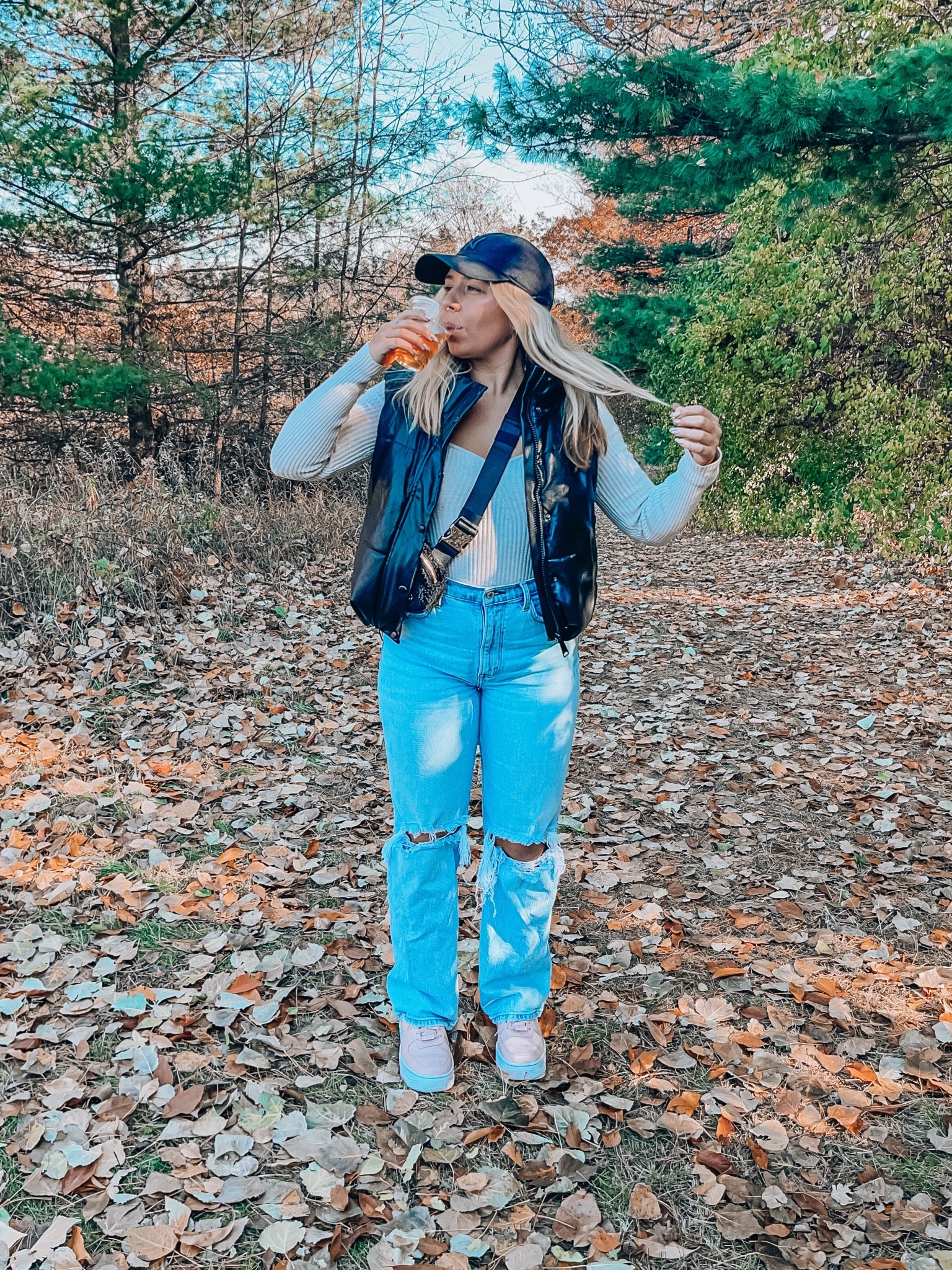 Easy fall outfit!!! Leather vest, relaxed jeans, black hat, sherpa belt bag, neutral bodysuit, Nike Air Force one pixel 



#LTKunder50 #LTKstyletip #LTKunder100
