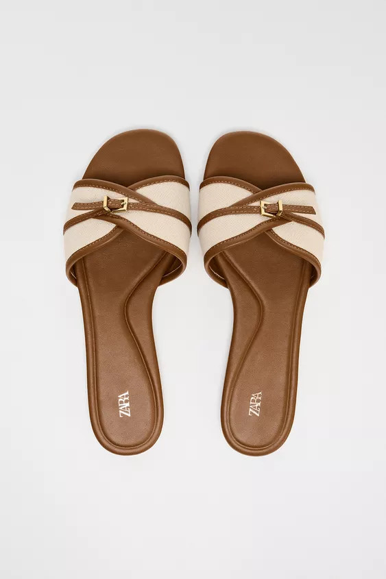 Flat canvas sandals. Buckle strap detail on the front. Rounded toe.Sole height: 1 cm. / 0.3″ | Zara US