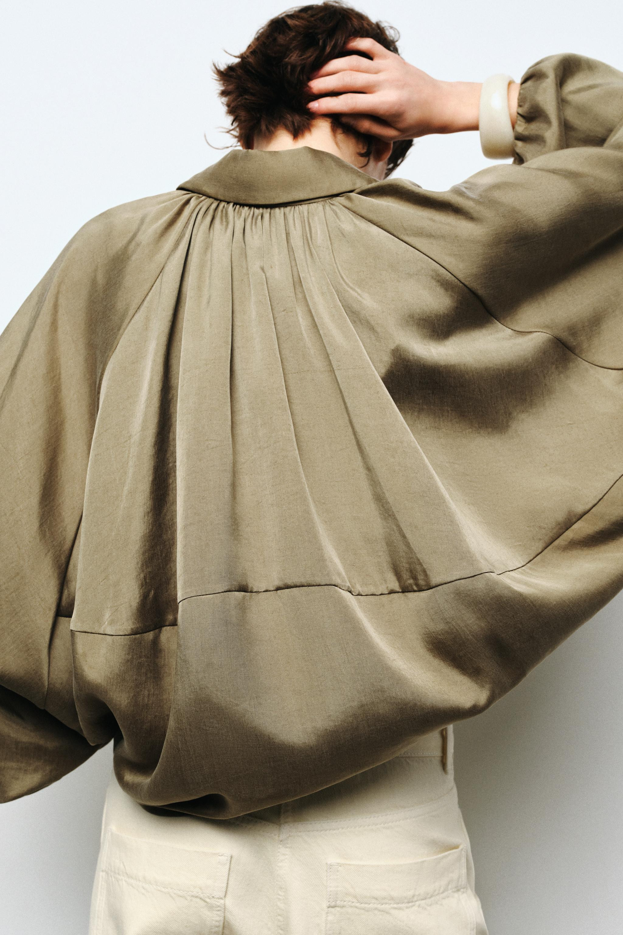 ZARA WOMAN COLLECTIONBomber jacket made of lyocell yarn. Lapel collar and long puffed sleeves. Pu... | Zara US