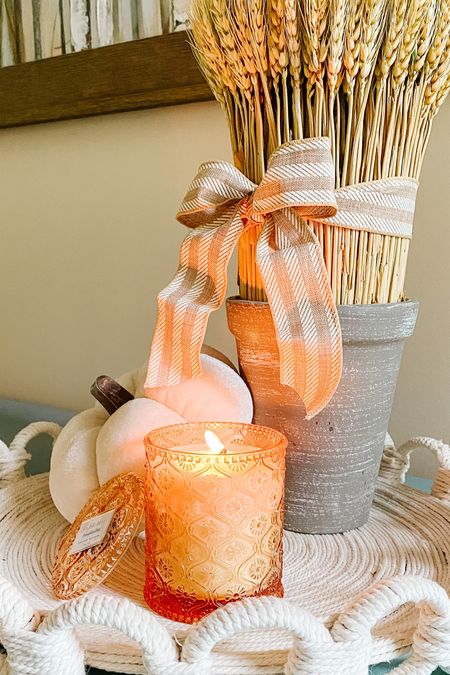 I’m obsessed with this little fall vignette in my master bedroom. I wanted the decor to be a little more of a neutral fall decor look versus my very “harvest” bright fall living room. I found the wheat bundle decor thrifting for $4.99. I made the tray. So this cute pumpkin and pumpkin chai candle smells incredible and not overwhelming at all.

Amazon finds
Amazon fall decor
Amazon decorating for fall
Neutral fall decor
Fall candles 
Pumpkin candle

#amazondecor #amazonfinds #amazondecoronabudget

#LTKhome #LTKfindsunder50 #LTKSeasonal