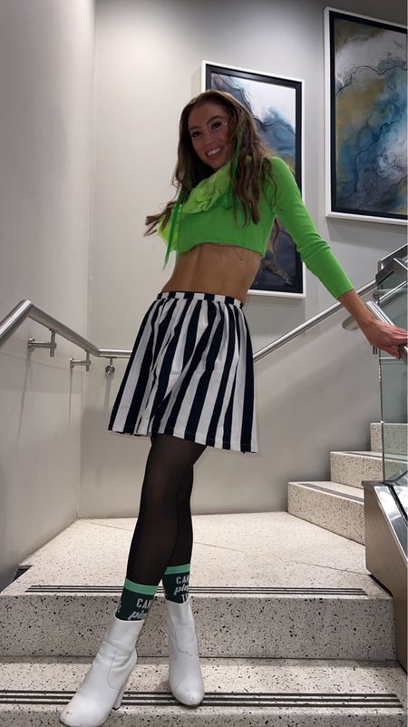 St. Patrick's Day style green hair extensions, colored hair, clips stripe skirt Christina Aguilera style, one shoulder top no pinch zone thermal tights

#LTKFestival #LTKunder100 #LTKSeasonal