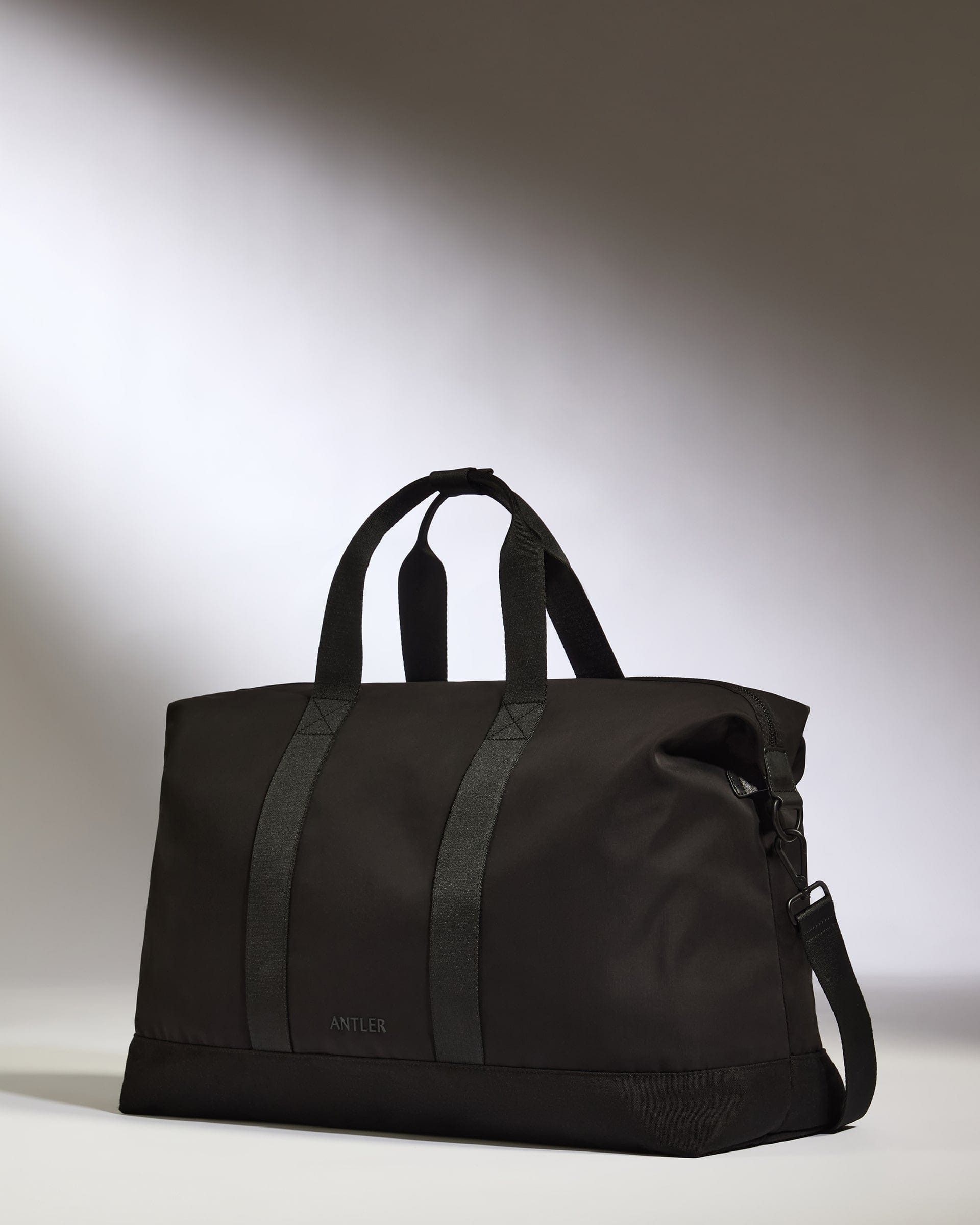 Icon Weekender Bag in Black | Travel & Lifestyle Holdall Duffel Bags | Antler UK