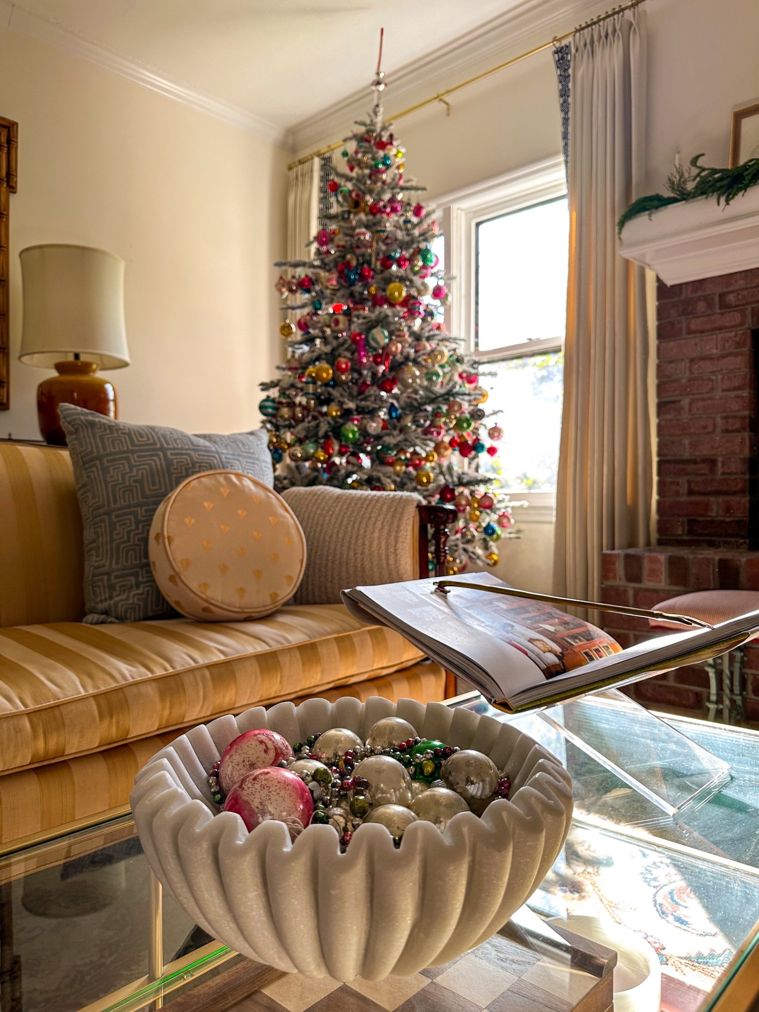  Christmas in the living room. I love adding vintage ornaments to different bowls around the house. Such an easy and fun way to add a pop of visual cheer! 

#LTKSeasonal #LTKHome #LTKHoliday