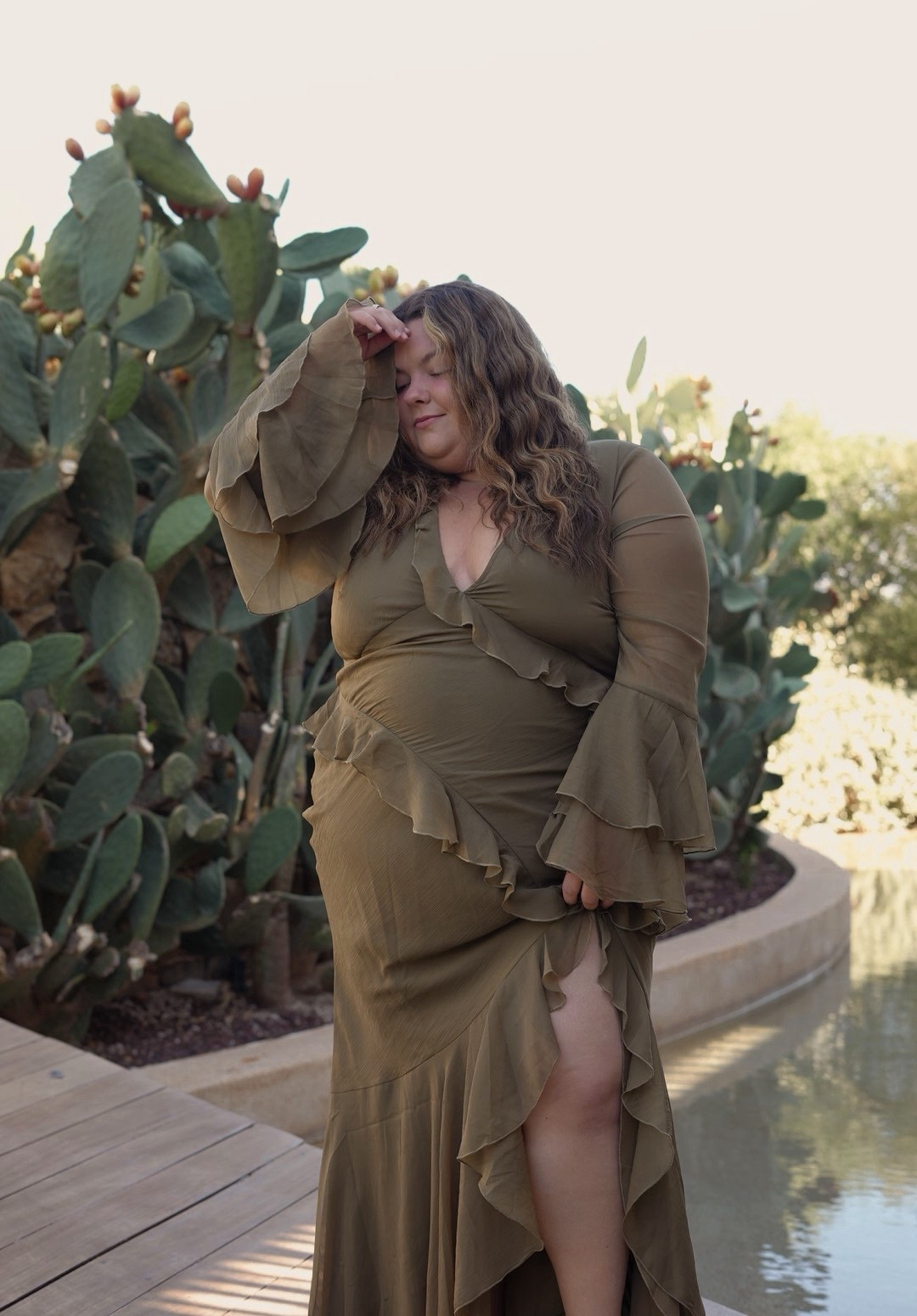 Plus size ruffle long sleeve green dress from ASOS. I’m wearing a size 20! 

#LTKTravel #LTKPlusSize #LTKMidsize