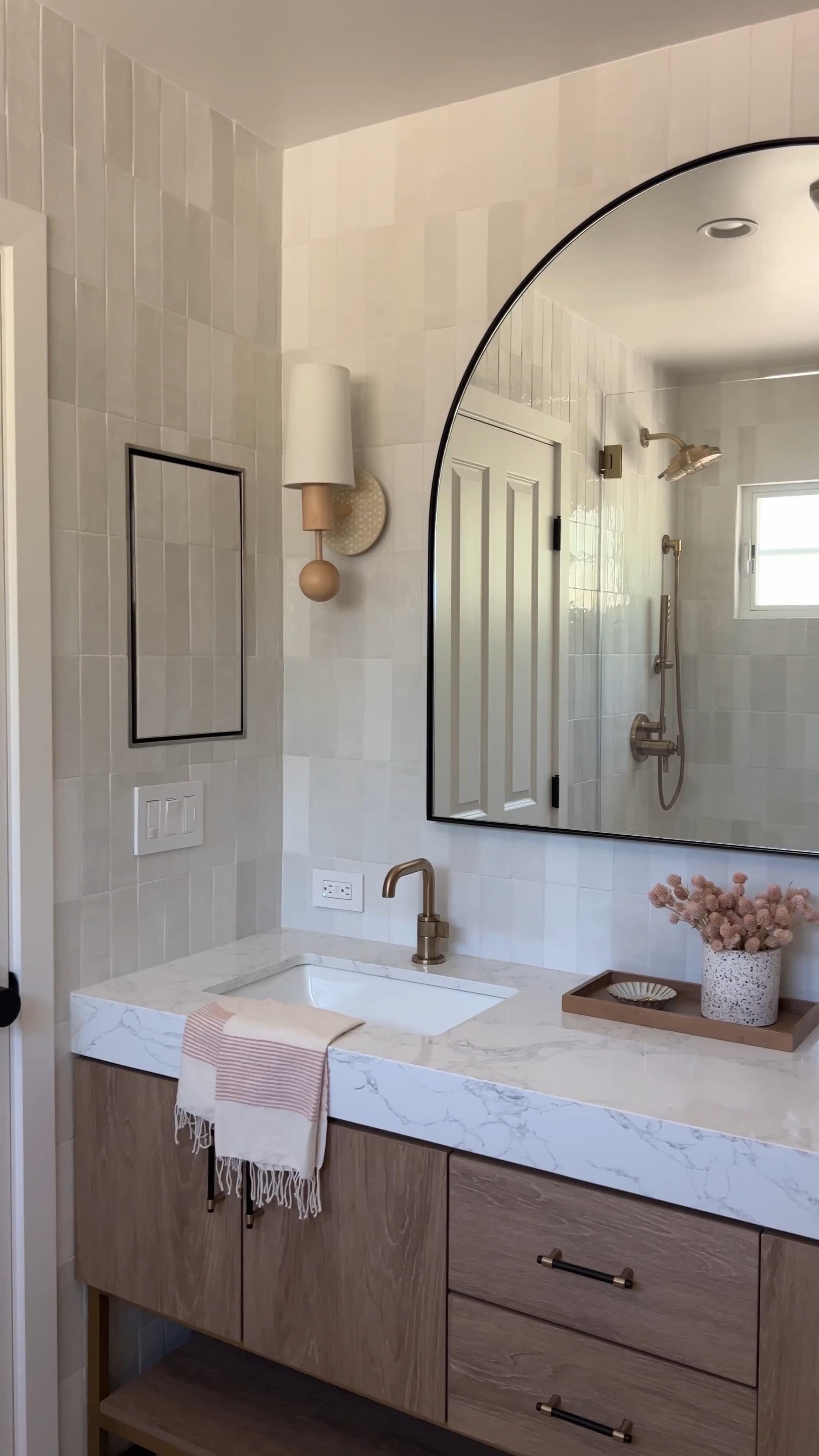 We saved thousands of dollars using this Vanity. Bathroom design
Wood vanity, brass plumbing, brass hardware, white tub, white tile affordable tile arched mirror glass shower door brass hook, brass faucet brass shower system Wayfair way day

#LTKSaleAlert #LTKHome #LTKFindsUnder100