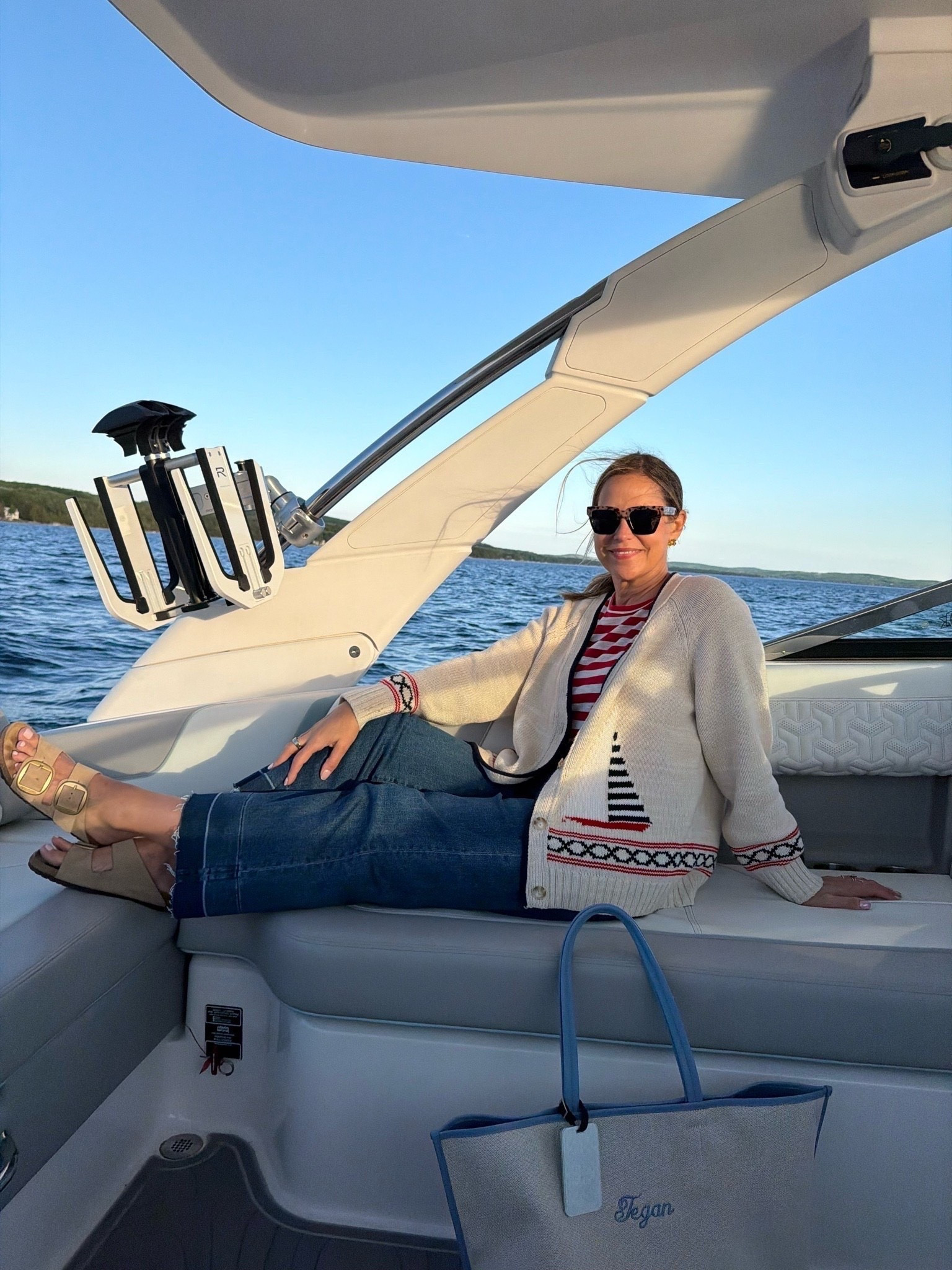 Sunsets on the lake can bring slightly cooler temps and this sailboat cardigan is just perfect to throw on! I love the coastal themes of summer fashion! s

#LTKSeasonal #LTKOver40 #LTKdayinmylife