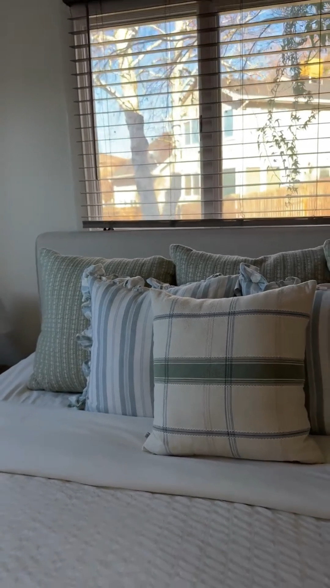 I’m obsessed with these pillows! Should I add more decor on my dresser, or leave it simple? And which blanket is better, Minky Couture or Lola Blankets?! I’m thinking blue or green to match the pillows!