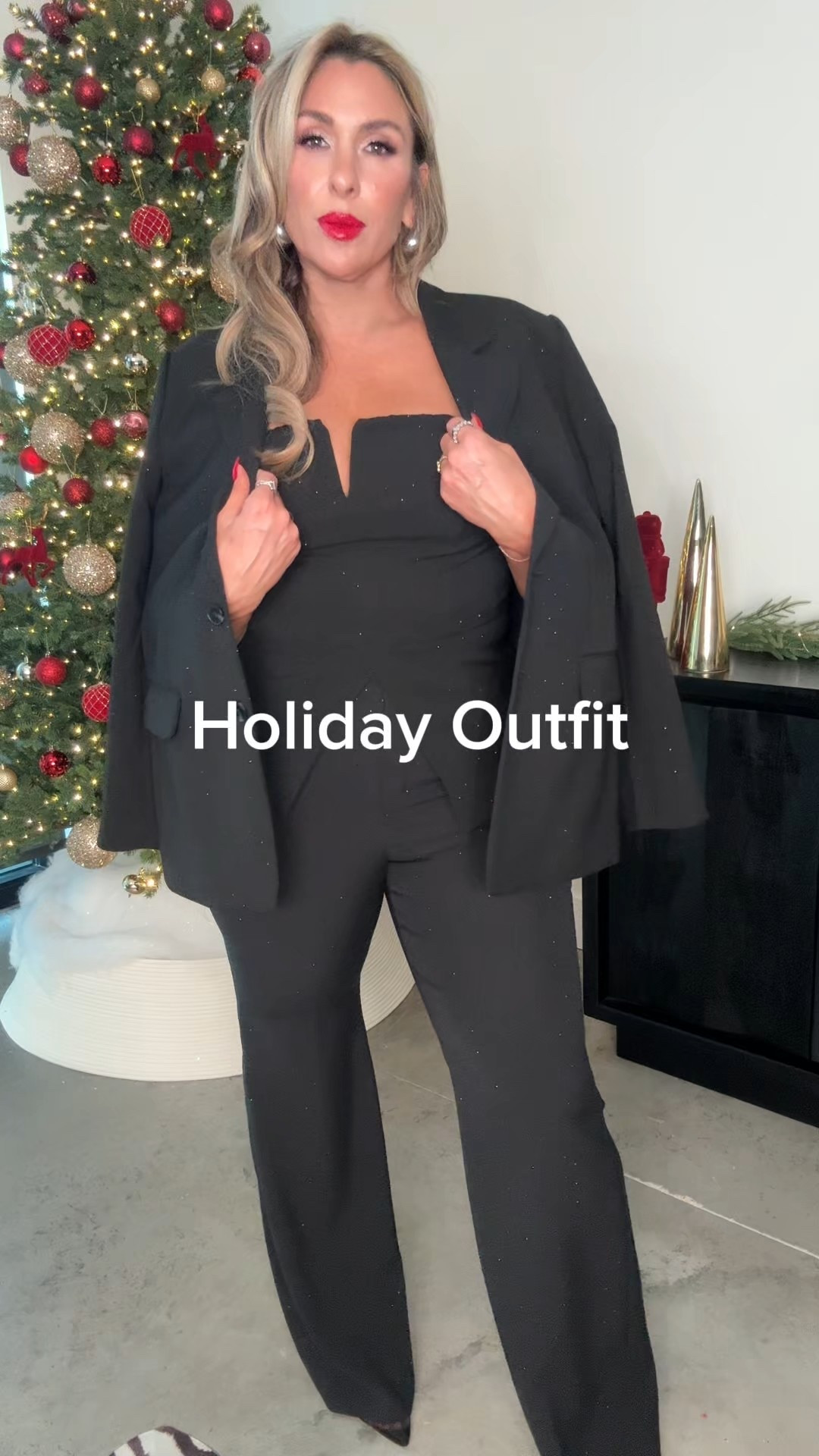 Midsize holiday look: an incredible three-piece suit embellished with black sparkly rhinestones — subtle but still a statement. Wear all three pieces together for full glam, or pair the suit with a satin bodysuit for a sleek, elevated vibe.

blazer XL (fits oversized) 
strapless top L (stretch, zipper, boning) 
pants 12L (def tall girl friendly. I have length with a 3 inch heel) 

also linked a a satin bodysuit option and satin top option that would pair nicely 

lip: red glossy non transfer lip color “on a mission” (the picture looks pink, but it’s a bright red) 

#LTKBeauty #LTKMidsize #LTKHoliday
#holidaydress #holidayoutfit #christmasoutfit #sequinoutfit #holidayoutfit

#LTKHoliday #LTKMidsize