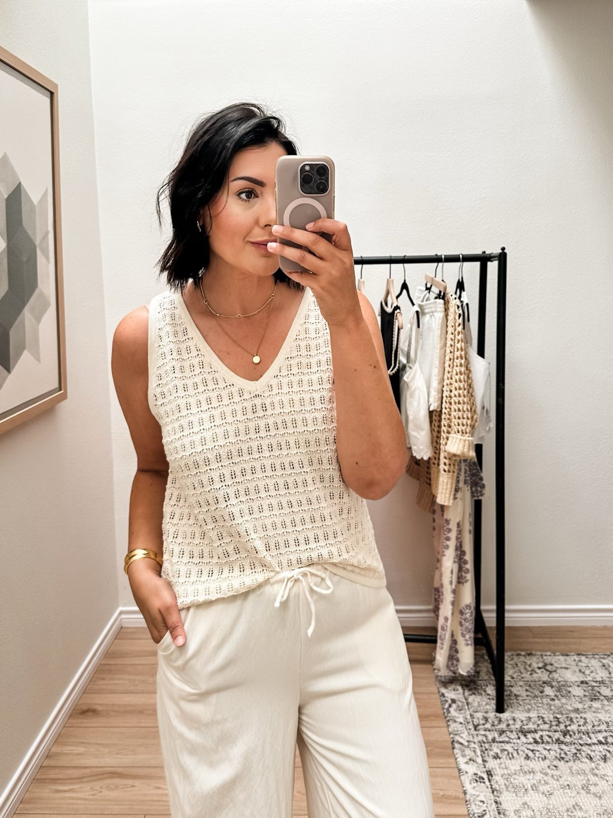 First of all, these pants are FULLY lined like all the way down. And that is SO nice when it comes to white pants. These are not linen, they’re a flowy fabric with a touch of a sheen to them. VERY comfortable but chic as well. I am in the large and they fit perfectly for me. The drawstring is adjustable but I wouldn’t say it would make that much of a difference with sizing.

This sweater top is so lightweight and airy. Really nice option for summer. However it does run big – I am in the large here and a medium would fit me best. It’s just a bit big overall. I love it with the pants, as well!  

 #LTKSummerEdit #LTKOver40 #LTKFindsUnder100