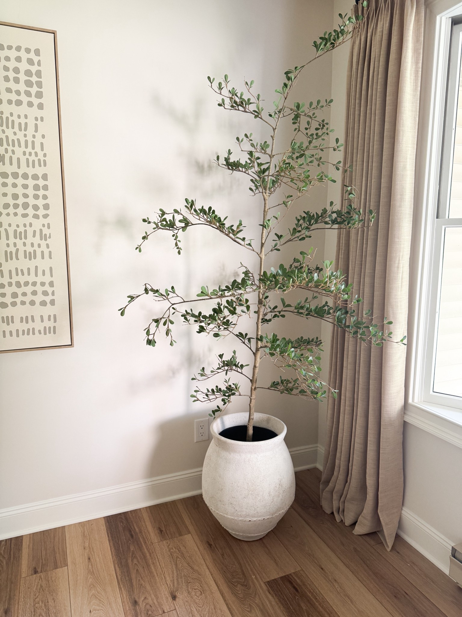 Faux olive tree under $50! We have the 7’ option 

#LTKHome #LTKFindsUnder50