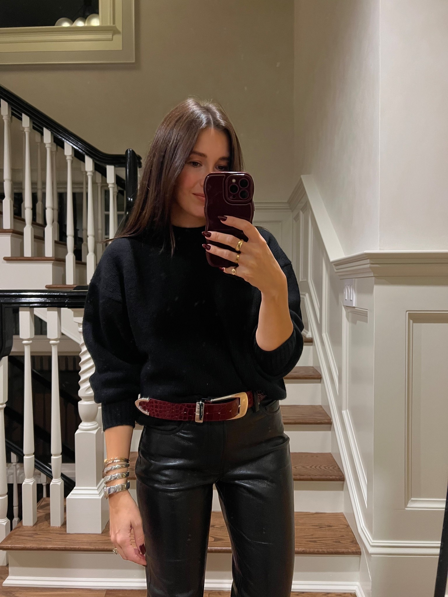 Black sweater, black, leather pants, croc belt