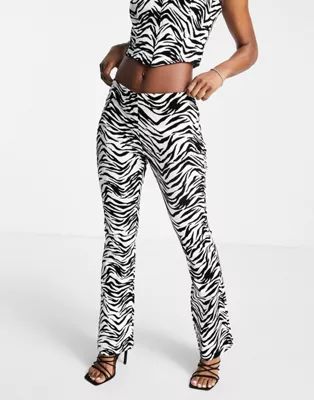 ASOS DESIGN low rise zebra flare pants with black velvet - part of a set | ASOS (Global)