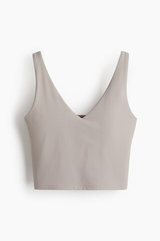 H & M - Yoga-BH mit SoftMove Lycra Medium Support - Warmes Grau | H&M (DE, AT, CH, NL, FI)