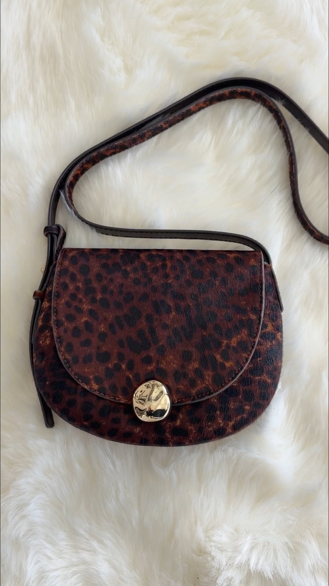 Love this gorgeous Madewell leopard print calf hair saddle bag! Such a beautiful accessory for fall and winter outfits and such a great size. It’s roomy enough to hold a larger size phone, small wallet or card case, keys and lip gloss. The adjustable crossbody strap is great for being hands free and there’s a magnetic clasp to hold the bag closed. Great for everyday wear, workwear, travel or as an evening bag. Such a nice Valentine’s Day gift idea or treat yourself to this beautiful  purse! 

#LTKWorkwear #LTKTravel #LTKValentine