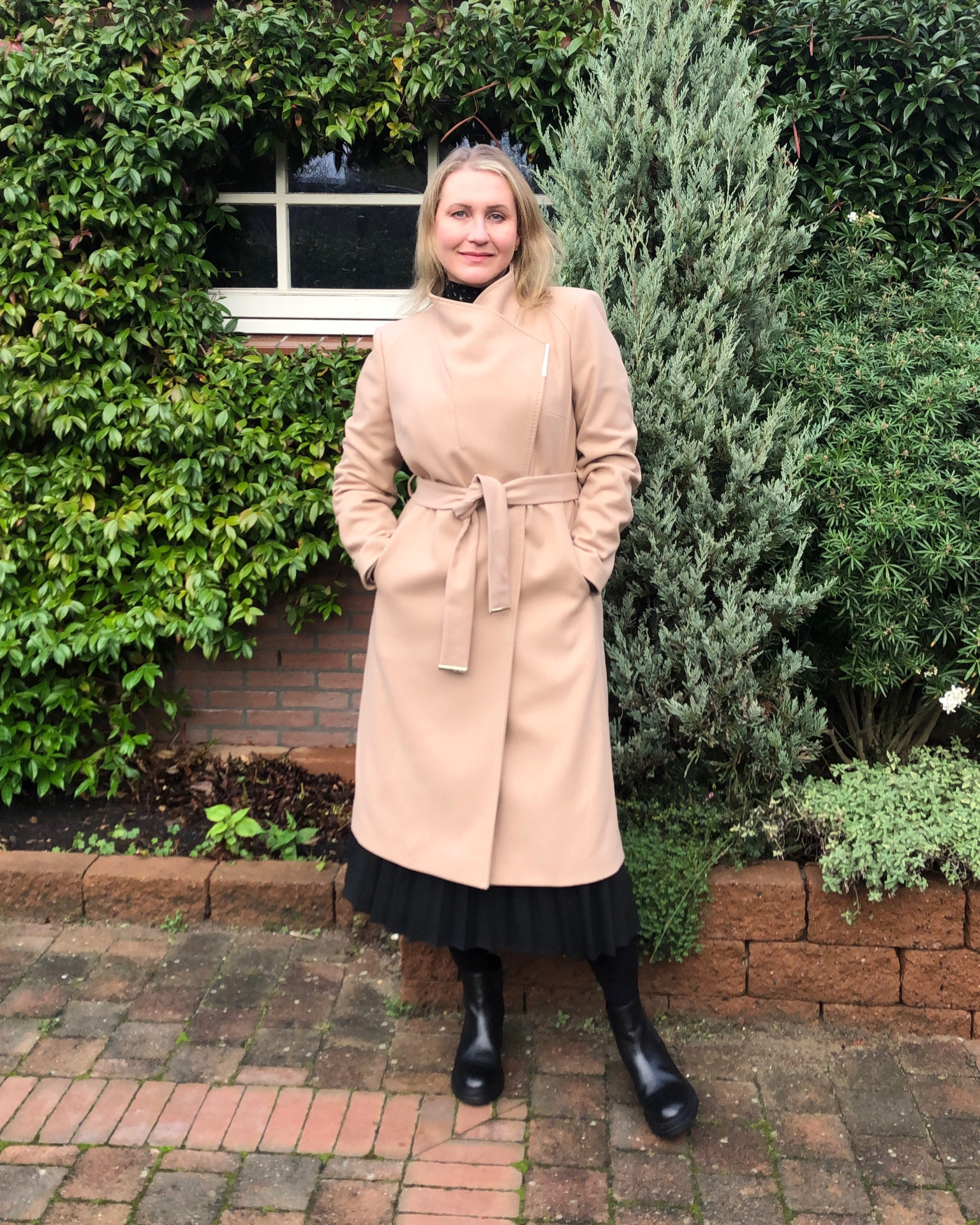 Coat Crush No.1: Wool wrap coat “Rose” by Ted Baker

Mine is chic beige but this coat comes also in black and some seasons they bring the model in elegant statement colors. 

This is hands down one of the best investment coats I’ve ever bought and can see myself wearing this for many seasons to come. 

This coat style is perfect for seasonal occasion dressing but I also wear it to more formal work events. 

I am wearing a 4 (US10 | EU40) which allows me to wear a blazer under it. 

A real must have in any classic feminine wardrobe ✨✨✨

Camel coat, wool coat, belted coat, wrap coat, chic style, elegant style, timeless elegance, evening coat, occasion wear 

#LTKworkwear #LTKHoliday #LTKstyletip