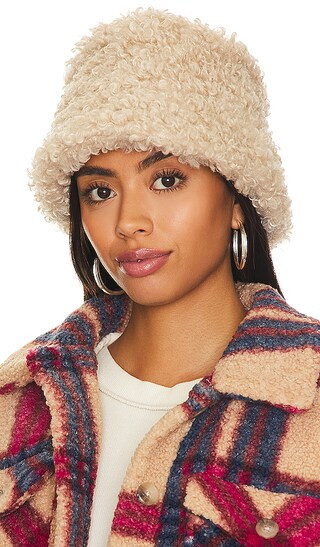 Faux Fur Hat in Cream | Revolve Clothing (Global)