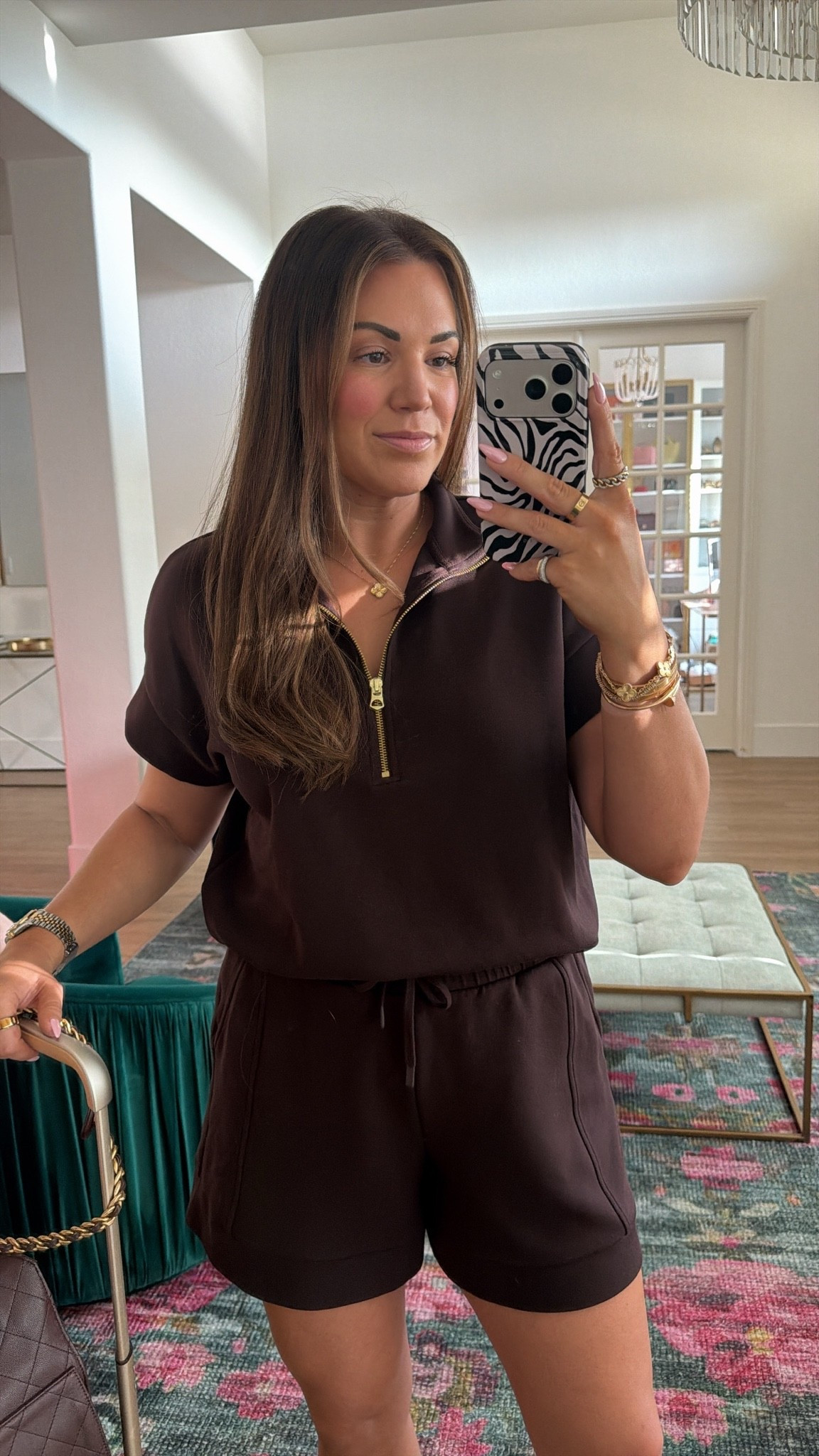 midsize travel look! wearing size small in brown half zip top (runs bit, size down!) and size large in brown shorts. love this chic and comfy set for traveling!

#LTKSeasonal #LTKOver40 #LTKTravel
