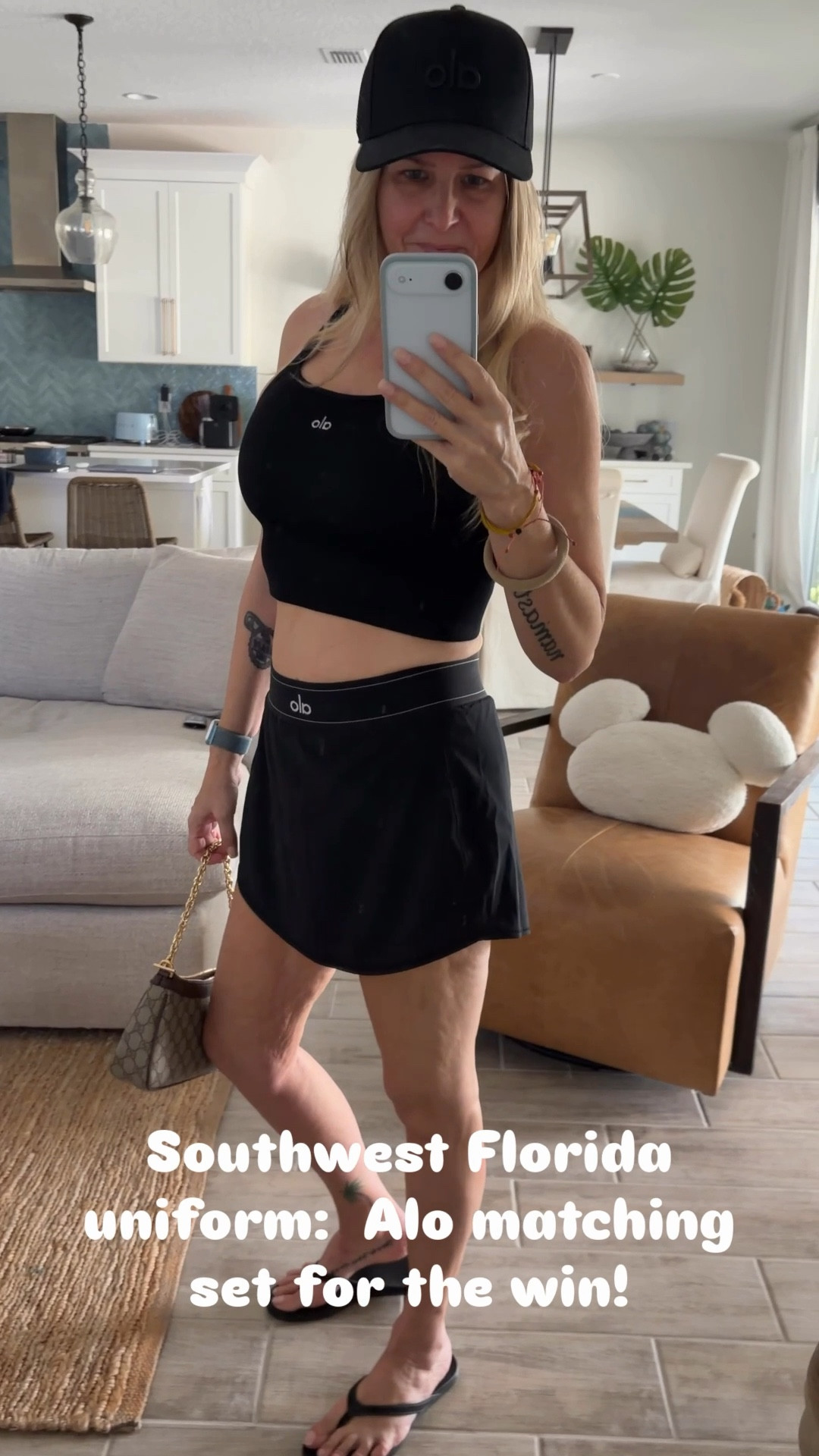 The SWFL Uniform: Monochrome, Mini & Manifesting a Boat Day

Mondays in Sarasota require a specific kind of armor. ☕️✨ I’m leaning into the Alo Yoga monochrome look today because nothing says "I have my life together" like a perfectly matched black set.
The Match Point Tennis Skirt is the GOAT of skirts—it’s the perfect length (not too short, just right for 54) and pairs seamlessly with the Ribbed Favorite Tank Bra. Topped it off with the District Trucker Hat because, let’s be real, the Florida humidity is no joke for a blonde with extensions. 👱‍♀️💨

Elevating the sport vibes with my Gucci Ophidia bag and the only flip flops that actually belong on a boat: Olukai. Comfortable, high-end, and Sarasota-approved. 🌴👡

• Tank & Skirt: Wearing Size Small (True to size with great hold).
• Hat: Adjustable (The perfect "cool girl" fit).

Is there anything better than an all-black fit in the bright Florida sun? 🖤☀️ Linking the full "Salty Sport" look below!
#SaltyAt54 #AloYoga #SarasotaStyle #SWFLInfluencer #GucciOphidia #Olukai #TennisCore #ActiveLuxury #MonochromeStyle #FitAt54

#LTKdayinmylife #LTKootd #LTKOver40