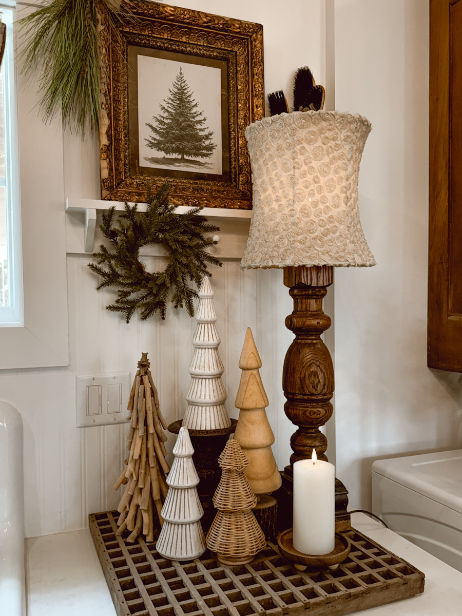This is the second way I styled this antique air vent. Instead of a backdrop, I used it as a riser for these tabletop Christmas trees.  

 #LTKHoliday #LTKHome #LTKStyleTip