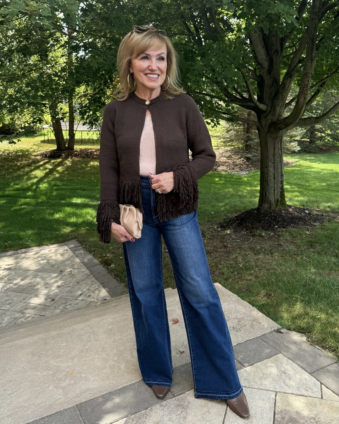 Fringe isn’t going anywhere…just in case you were wondering.

You may immediately think of suede or leather when you think of fringe, but there are softer ways to wear fringe, like this sweater from Zara. It has more of a “cozy feel”. Can’t you picture wearing a cozy fringe sweater by the fire this winter? Just add a glass of wine!

I’ve put together a collection of fringe sweaters for you. Unfortunately, my cardigan sold out quickly but I have lots more options for you! 

#LTKSeasonal #LTKOver40 #LTKStyleTip