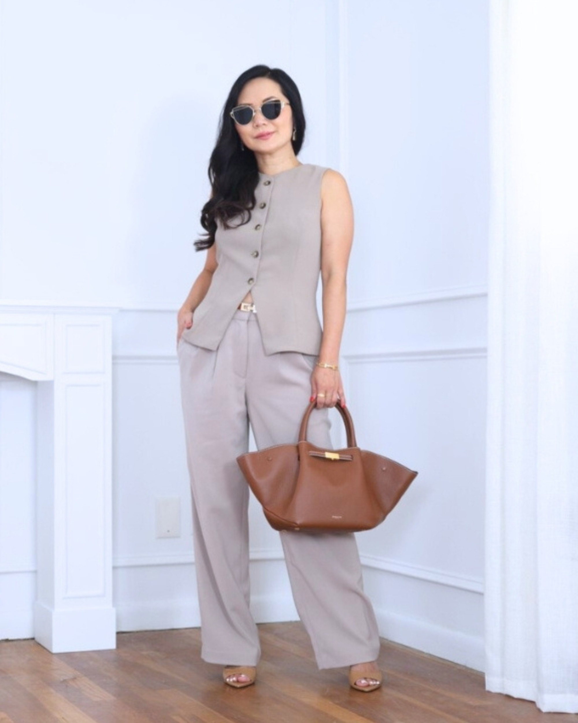 Wearing a vest top from Aritzia with wide-leg pleated pants from Quince — simple, polished, and effortlessly chic. I’m 5’2, wearing size S.

#LTKOver40 #LTKStyleTip #LTKPetite