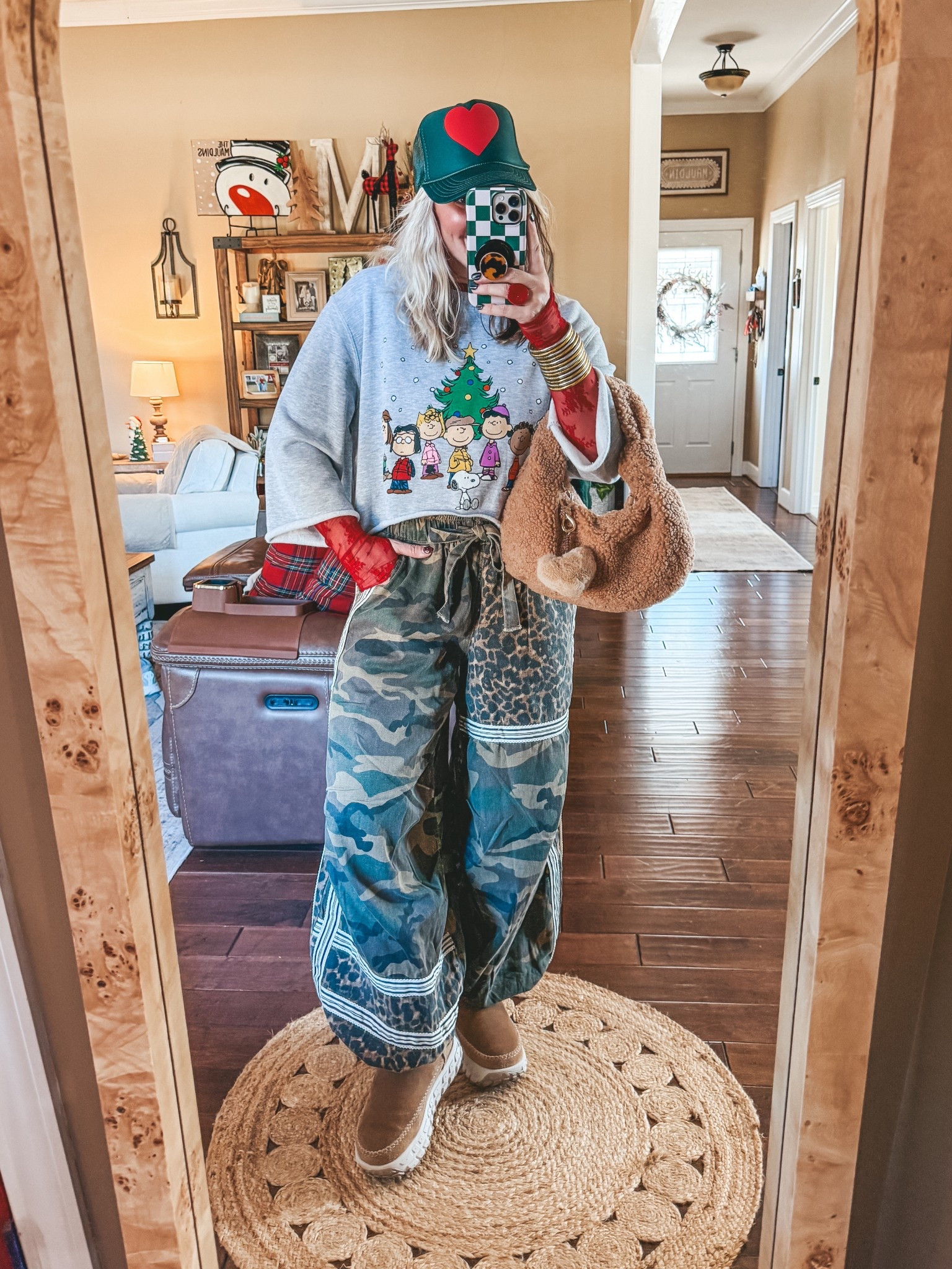 I love to cut a sweatshirt shorter to longer like this. Also cutting the sleeves to see your tee or mesh top is so cute! I’m in a XL & it’s a few years old so I linked similar. 

My pants are a medium and they are from @shopeveverydaychic save with code MANDIE10 


#LTKootd #LTKFindsUnder50 #LTKOver40