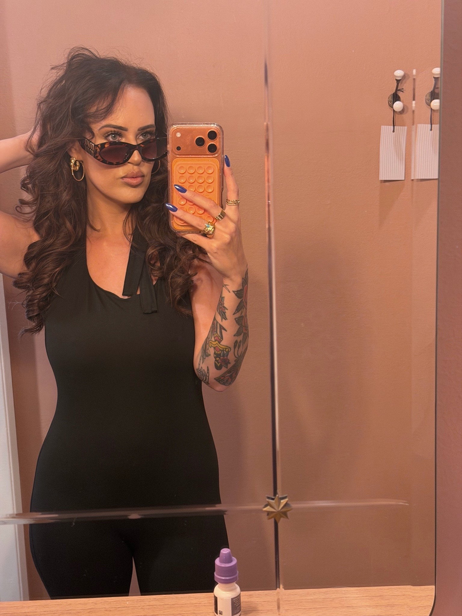 Black halter jumpsuit

#LTKgrwm #LTKootd #LTKdayinmylife