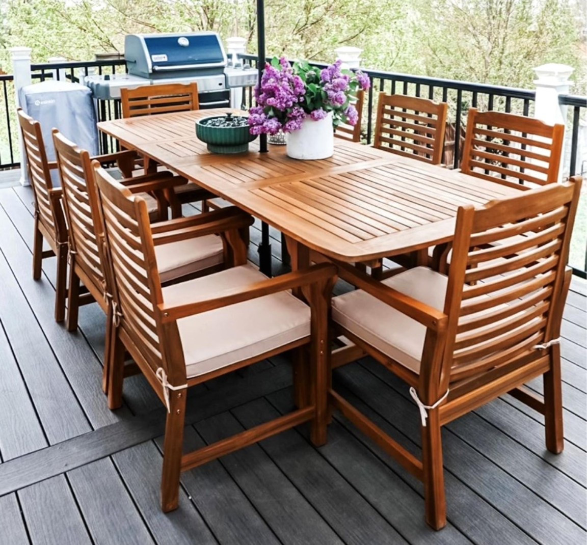 Acacia wood patio dining set with that warm farmhouse outdoor living feel that makes summer hosting look straight out of a countryside retreat. 🌿 Perfect for backyard dinners, Memorial Day cookouts, Father’s Day gatherings, patio brunches, pergola setups, porch dining, or slow golden hour evenings when you want outdoor furniture that feels timeless and inviting. The expandable teak table, wooden chairs, and soft cushions give it that relaxed gathered-around-the-table atmosphere that pairs perfectly with a Weber grill and summer nights outside. 

Order before Memorial Day and Father’s Day hosting season starts selling out. ✨

#LTKOver40 #LTKHome #LTKfoodie