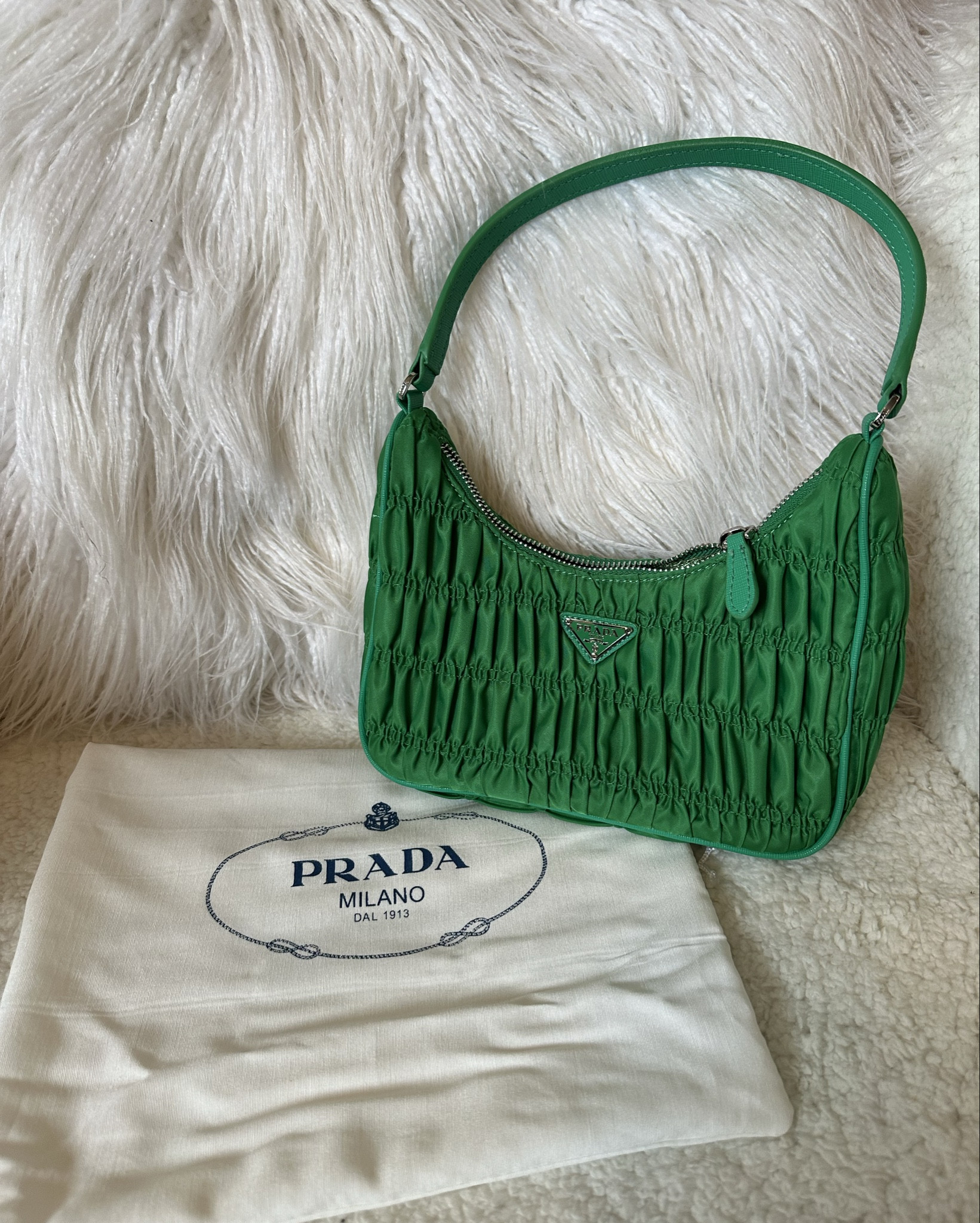 Prada rouched nylon bag. Comes in tons of colours and different styles.


#LTKsummer #LTKbag #LTKspring