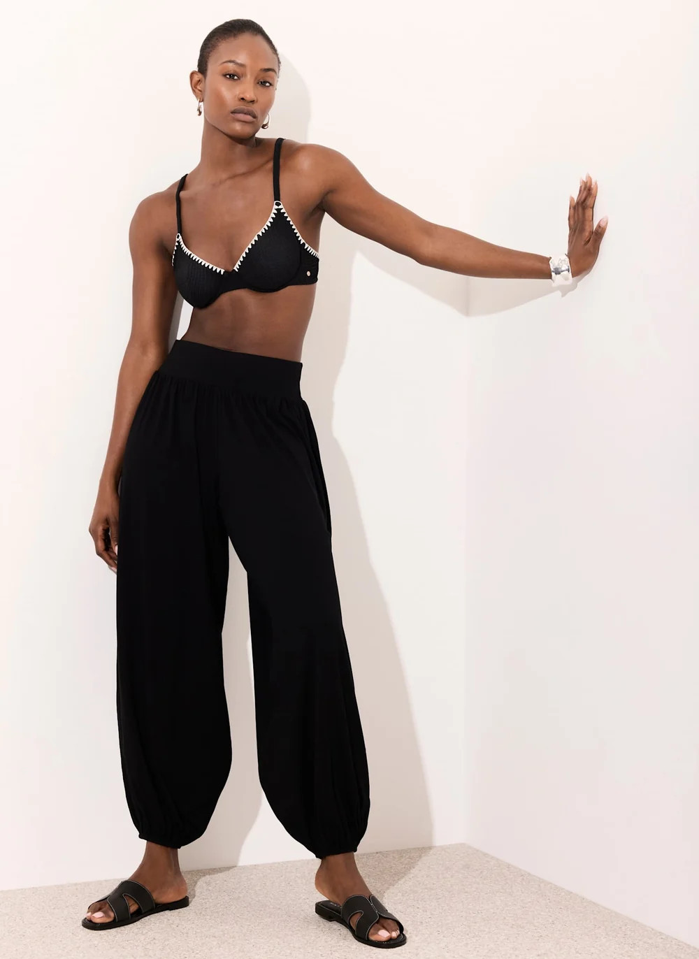 SHOP THE LOOKBlack Jersey Balloon Trousers£59.00Colour: BlackSize Guide
  
Length:ShortRegularLo... | Mint Velvet