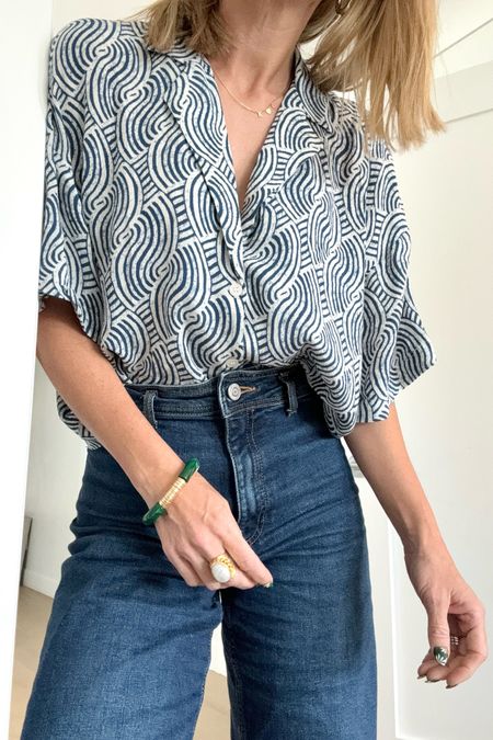 This boxy printed button down has been my favorite purchase for spring and summer.  Paired with a high rise wide leg dark denim jean or white  jeans look great too. 

#Jeans #WideLegJeans #SummerOutfit #SummerTops #AffordableStyle 

#LTKStyleTip #LTKFindsUnder50 #LTKSeasonal