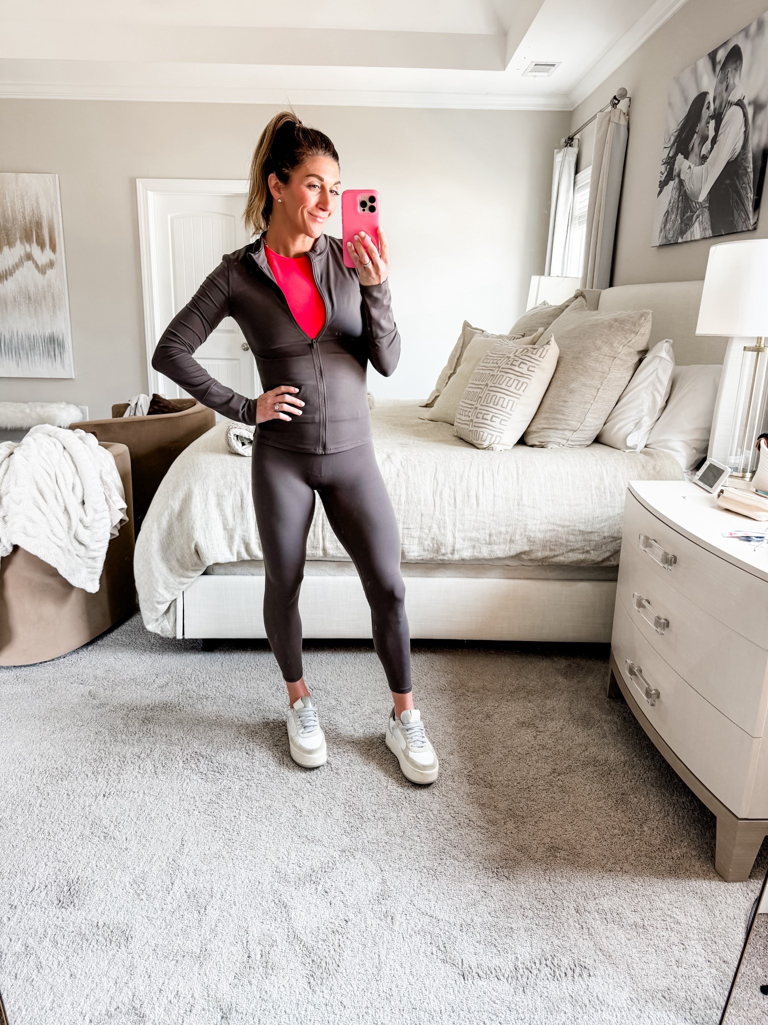 Loving this new activewear from P’Tula! Get 10% off here with code: TAKECARE

Jacket is super stretchy and buttery soft. TTS- wearing a medium.
Leggings are also the same material. Lightweight, stretchy and hold you in. TTS- wearing a small.
Color is: Gunmetal Grey

Feathertech Studio sports Bra & Tee underneath.  They are buttery soft. No padding in bra but the band underneath is super supportive and this would be easy to pull down for nursing active mamas too! 
Tee is fitted and super stretchy. Color is Hot Hibiscus. TTS-wearing a medium in both. 

Necklaces are Allie + Bess & Electric Picks 

Active | fitness | p’tula | Lululemon | top | sports bra | nylon | athletic | material | yoga | CrossFit | fit | mama | athleisure | athlete | running | Pilates | workout brands | buttery soft | daily | moms type | goals | tee | leggings | jacket | zip up

#LTKmomlife #LTKActive #LTKfitnessgoals