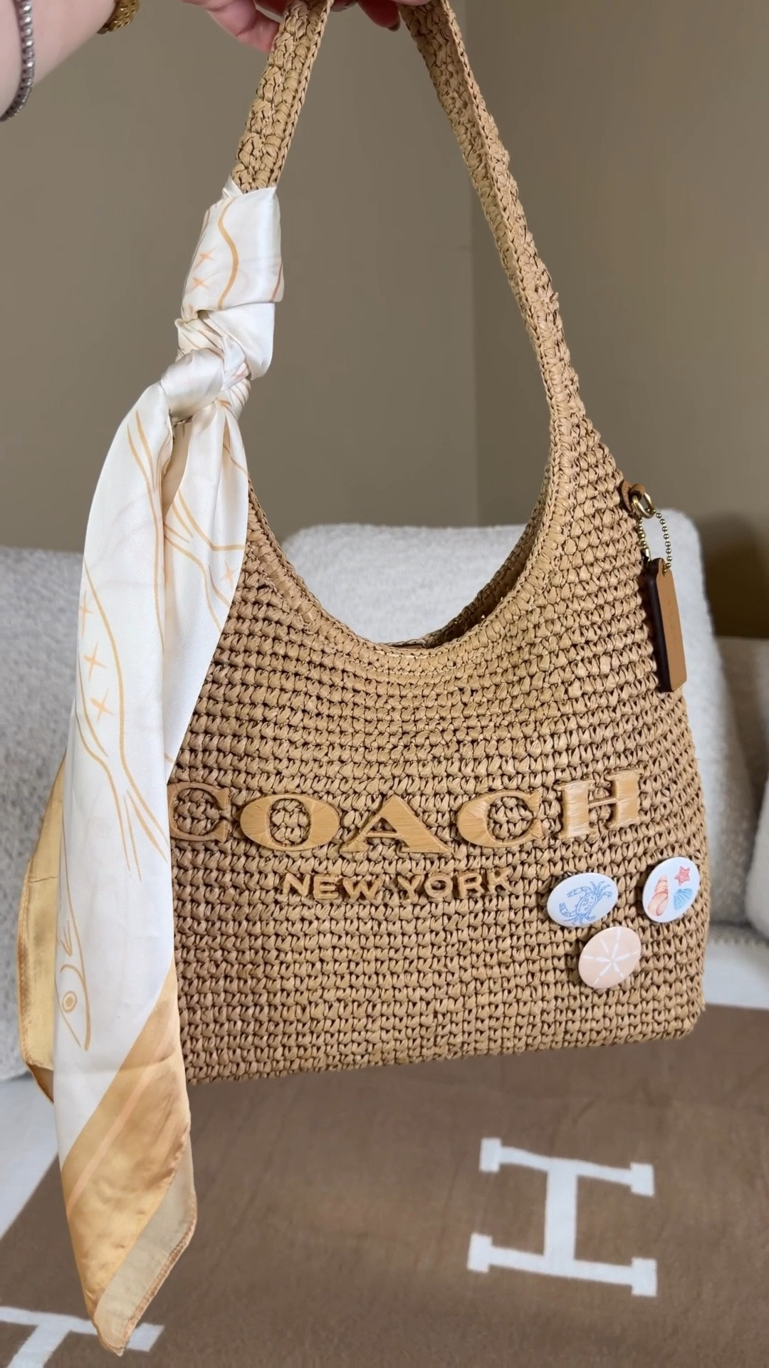 Let’s pack the beachy Brooklyn ☀️🏖️ 
Comment SHOP & I’ll dm you the links ☀️
I made these lil pins with a pin making am hung from Amazon 🦀🐚
Coach Brooklyn 28 
Brooklyn insert
Mini hydro flask 
Vacation spf stick
Sol de janeiro spray and lotion is perfect for summer!
Salt and stone deodorant 