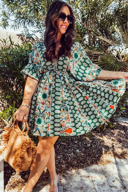 The perfect vacation dress 🌴🧡 wearing size small // Farm Rio inspired dress! 

#LTKfindsunder50 #LTKtravel #LTKsalealert