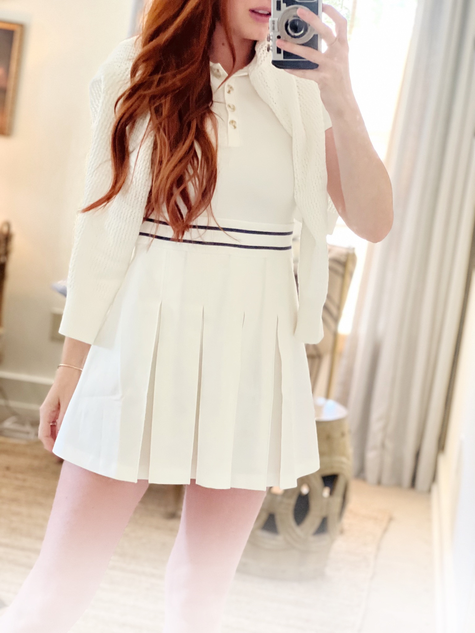 I am so excited for my kids to be big enough to play pickleball with us this summer! The girls have decided that our name is the “Box Babes” and we will play the boys, who named themselves the “sneakers” 😂🤷🏼‍♀️
This dress and sweater set is from my favorite athleisure brand. The dress zips up the side and the sweater has a classic v stripe in the front. The brand had this look last season and produced it again! It’s timeless and well made. 


#LTKfit #LTKworkwear #LTKFind