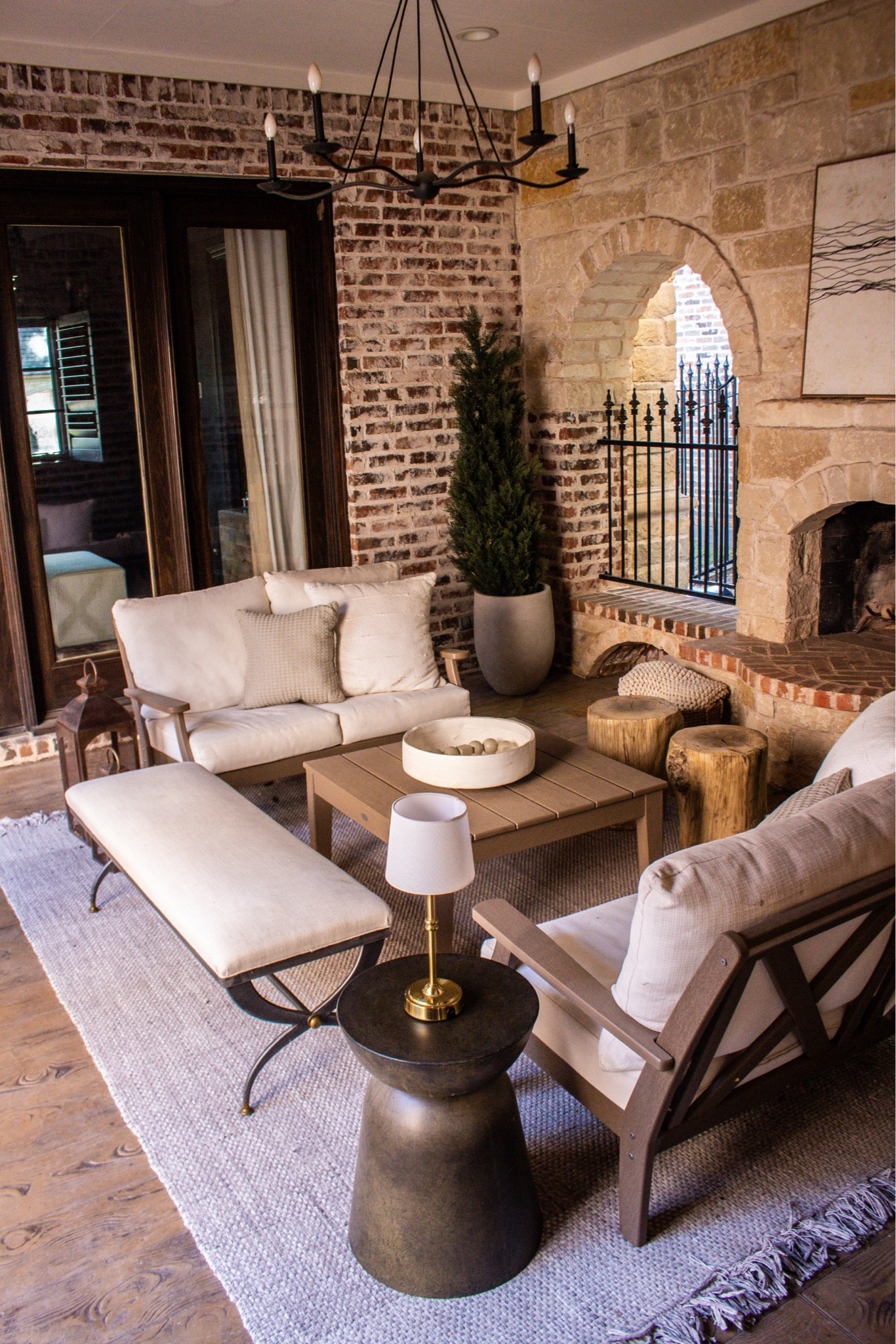 A covered patio that feels warm, cozy, and completely timeless. The stone fireplace, lanterns, and layered textures make this outdoor space feel like a true extension of the home.

covered patio, outdoor fireplace design, cozy backyard patio, neutral patio decor, lantern decor, outdoor living room, patio seating ideas, backyard design inspiration, brick and stone patio, outdoor entertaining

#LTKHome #LTKSeasonal