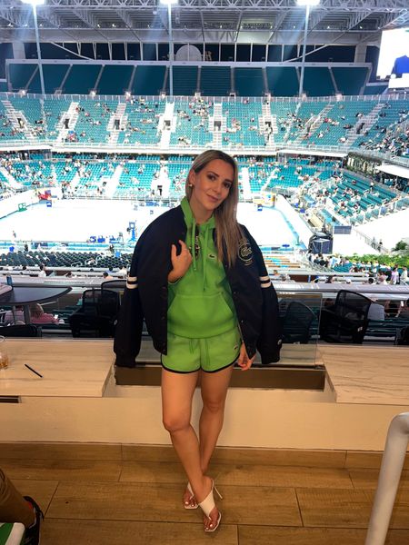 Game, set, match. Spent the evening at the Miami Open with Lacoste! 

This athleisure wear set is all from Lacoste, including this varsity jacket. It’s Alex’s but I’m borrowing it. 

Also wearing a mini Longchamp bag that’s perfect for bag requirements on venues. 

Links below! 

Tennis outfit, athleisure wear, varsity jacket 

#LTKstyletip #LTKitbag #LTKfitness