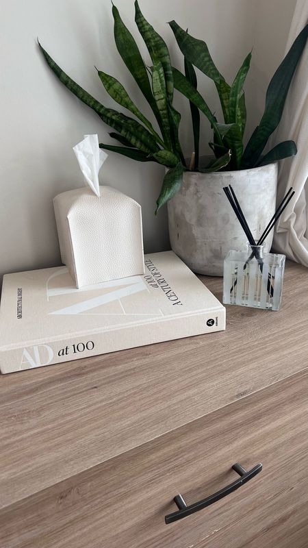 Dresser decor styling with AD coffee table book amazon tissue cover and favorite Nest fragrance reed diffuser smells the ENTIRE room! 


#bedroomdecor #dressertop #dresser #homeaccessories #dresserdecor 

#LTKhome #LTKFind #LTKU
