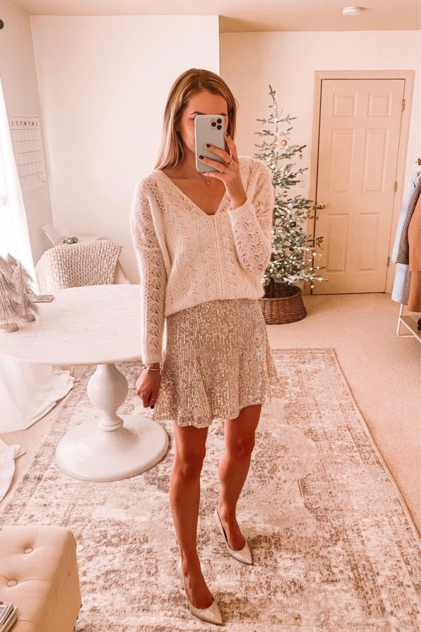 Monochromatic all white holiday look, sequin skirt, white cream sweater and sparkle heels. On sale! 

#LTKSeasonal #LTKCyberweek #LTKHoliday