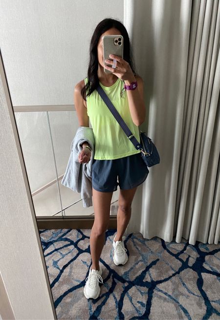 Athleisure. Workout tank top on sale for $24. Mesh back. I love this neon color. True to size or size down if you want it more fitted. High waisted shorts. 
Sneakers. 
Crossbody bag. Denim handbag  

#LTKActive #LTKOver40 #LTKSaleAlert