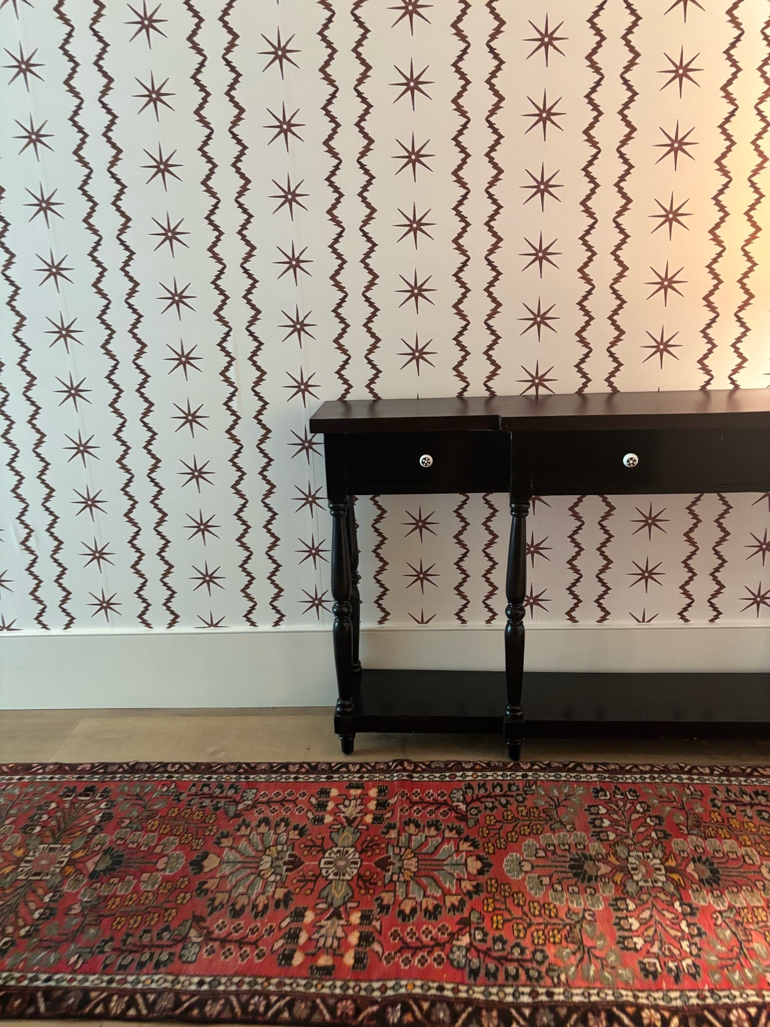Literally obsessed with this peel and stick wallpaper for the hallway.