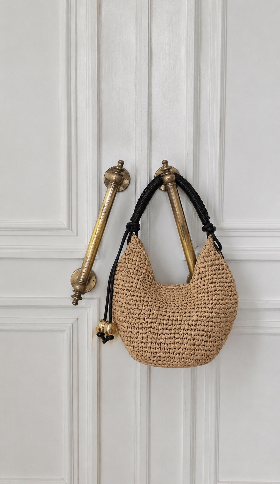 Found the prettiest woven summer bag ☀️ The neutral crochet texture + black handle details make it look so elevated and chic. Such an easy everyday summer bag that still makes the outfit feel special 🤍 

 #LTKfestival #LTKmidsize #LTKsale