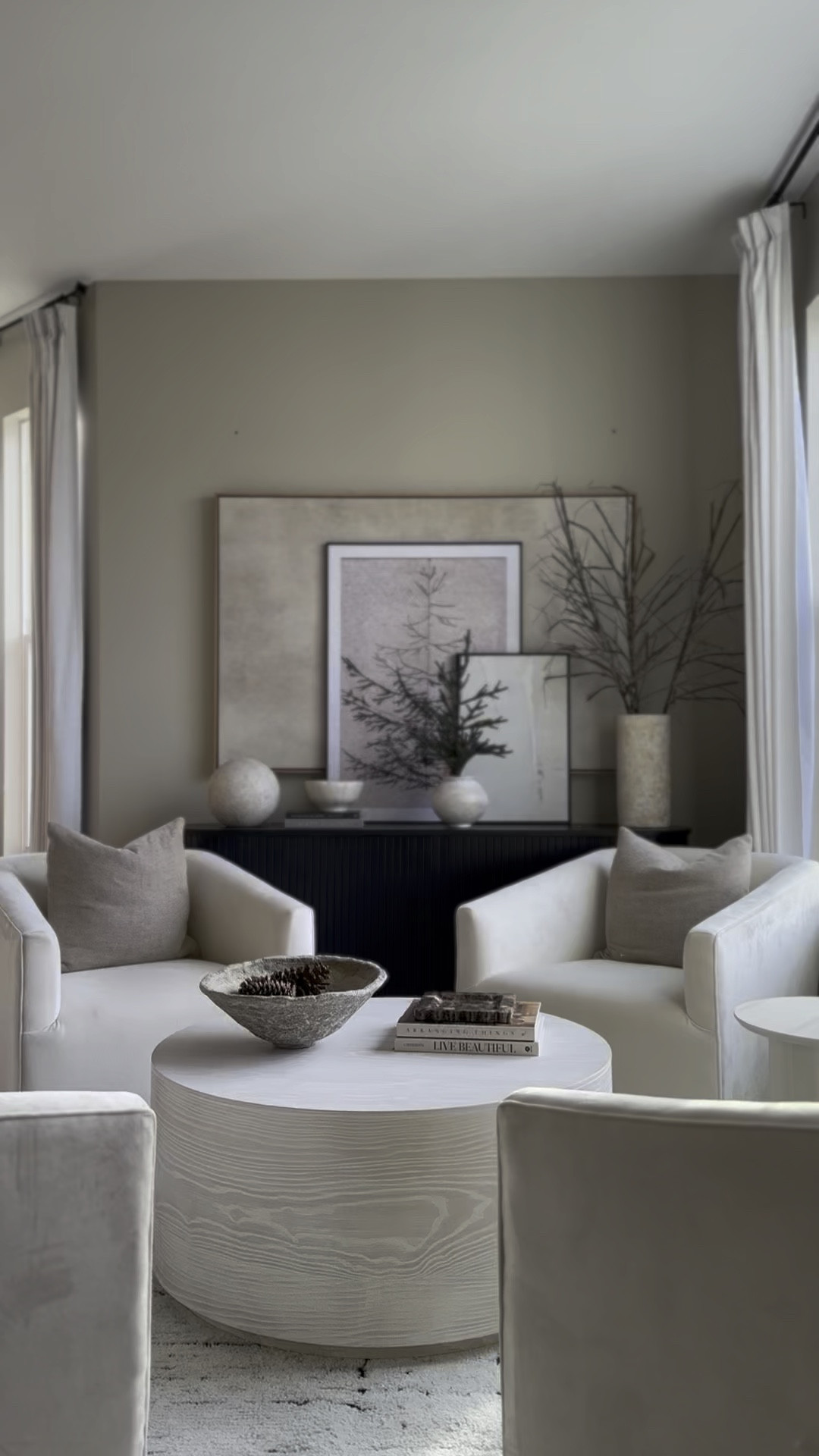 round coffee table in size 36, swivel accent chairs

#LTKVideo #LTKhome