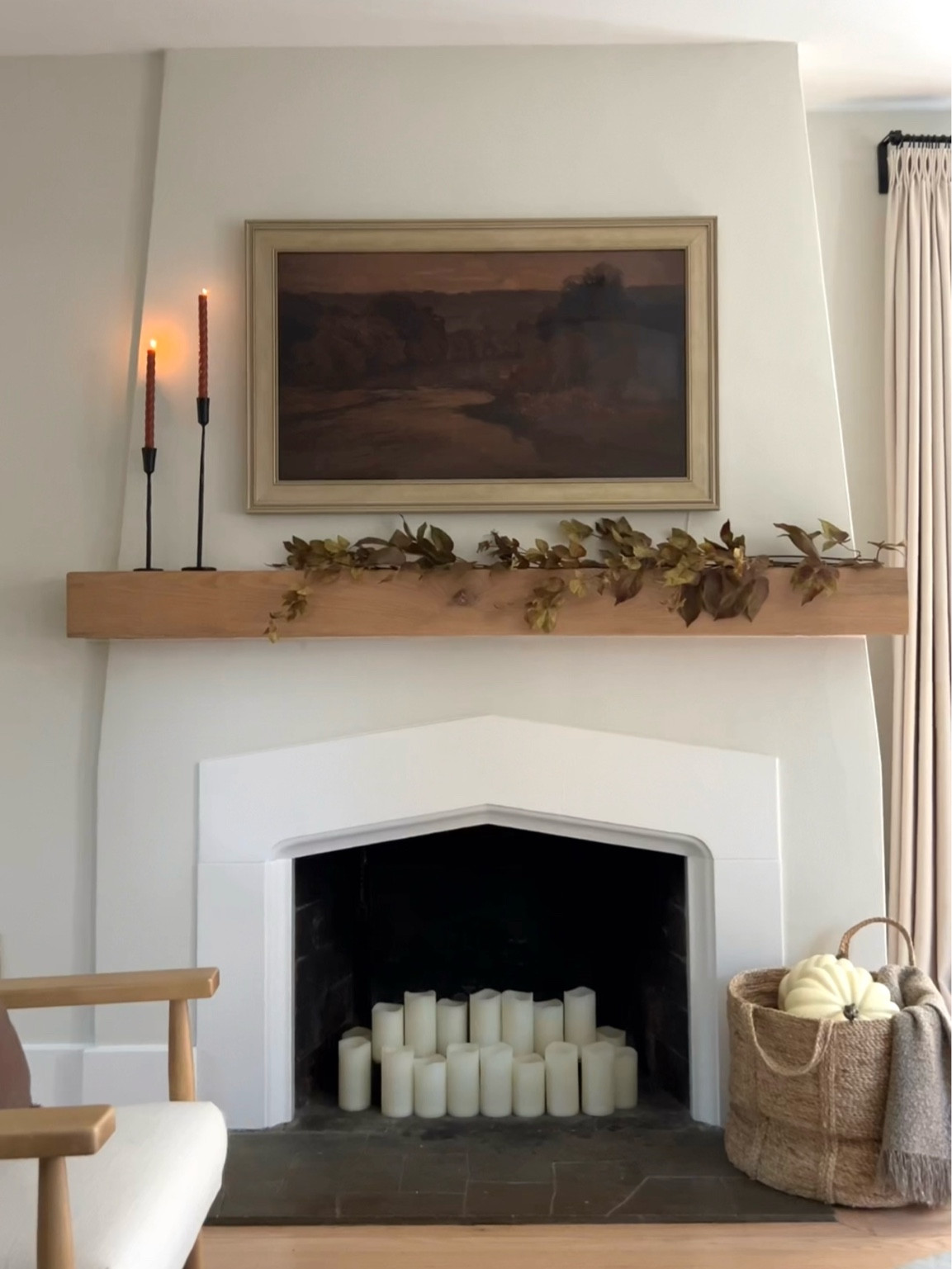 Our fireplace decorated for fall with artificial fall stems, fall candles, fall TV art, and faux pumpkins #fall #falldecor

#LTKHome #LTKSeasonal