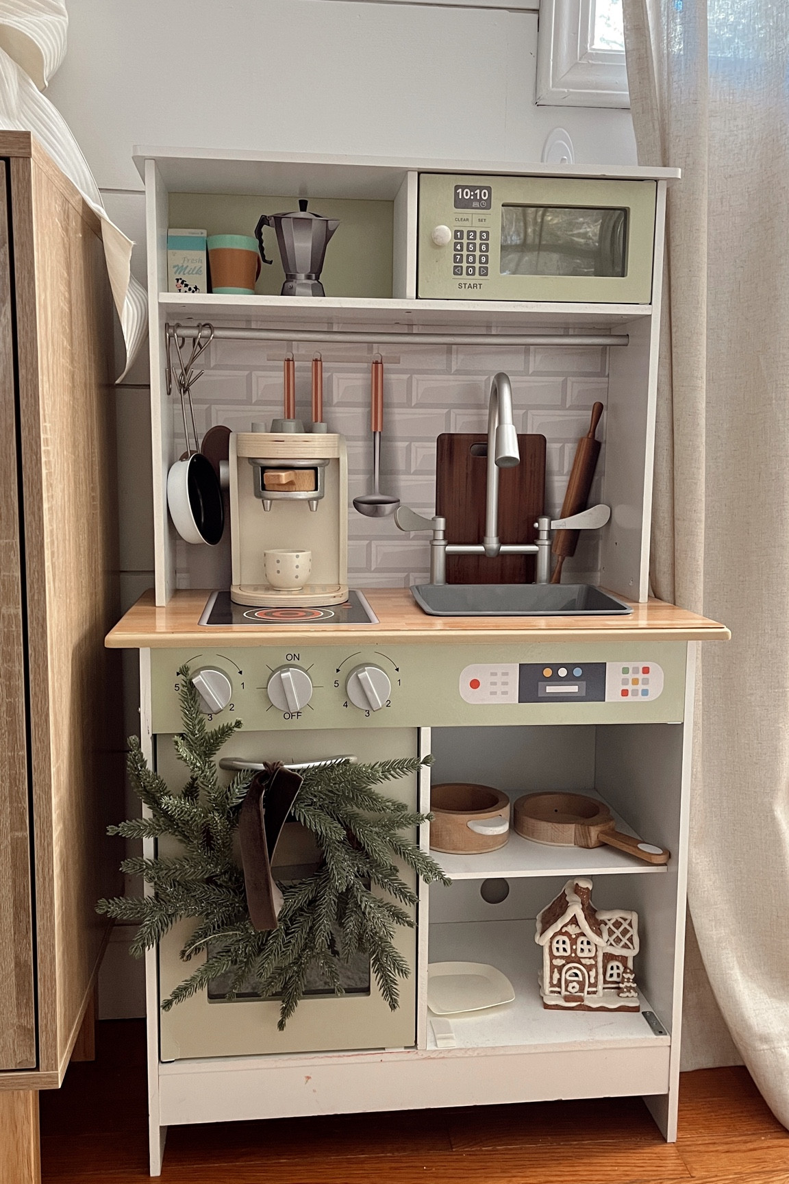 Toddler Kitchen decorated for Christmas - found these cute little wreaths at hobby lobby + we love this amazon kitchen & coffee maker! 

#LTKGiftGuide #LTKHoliday #LTKKids