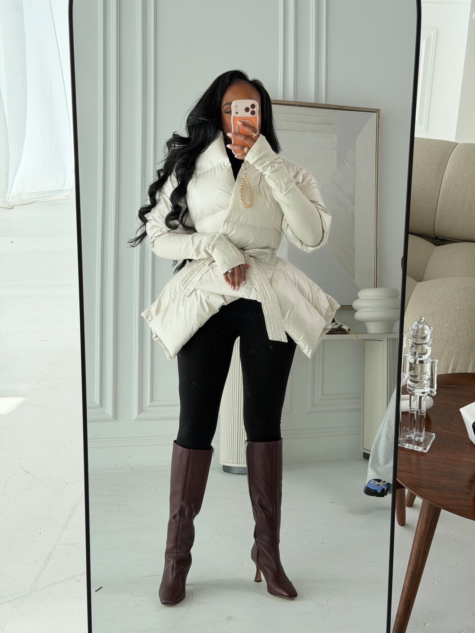 A belted puffer instantly takes a winter outfit from simple to polished — the cinched waist creates such a flattering silhouette while still keeping everything warm and practical. Paired with sleek black leggings and rich brown boots, this look is the perfect mix of cozy and elevated.

Perfect for cold-weather outings, winter travel, everyday errands, and bundled-up chic moments.

📏 Sizing: Jacket size Small; Top size Small; Leggings size Small; Boots true to size  
📐 Measurements: 5'4", 138 lbs, 34D bust, 27" waist, 40" hips  

Shop instantly on the app — everything is linked for easy access.

Featuring belted puffer jackets, sleek winter layers, cold-weather boots, minimal neutral styling, polished casual winter outfits, and chic everyday essentials.

Follow me on Instagram and YouTube @kirasfashionfinds  

#LTKSeasonal #LTKHoliday #LTKootd